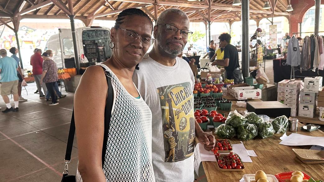 Karen and Ronald Hall shop for produce at the Eastern Market in Detroit on Tuesday, June 30, 2026. (AP Photo / Corey Williams)