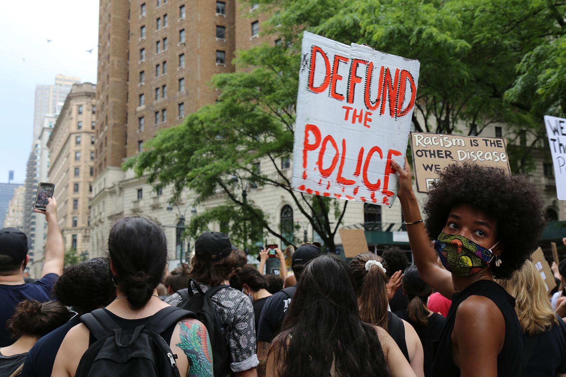 Protesters march Saturday, June 6, 2020, in New York. Demonstrations continue across the United States in protest of racism and police brutality, sparked by the May 25 death of George Floyd in police custody in Minneapolis. (AP Photo / Ragan Clark)