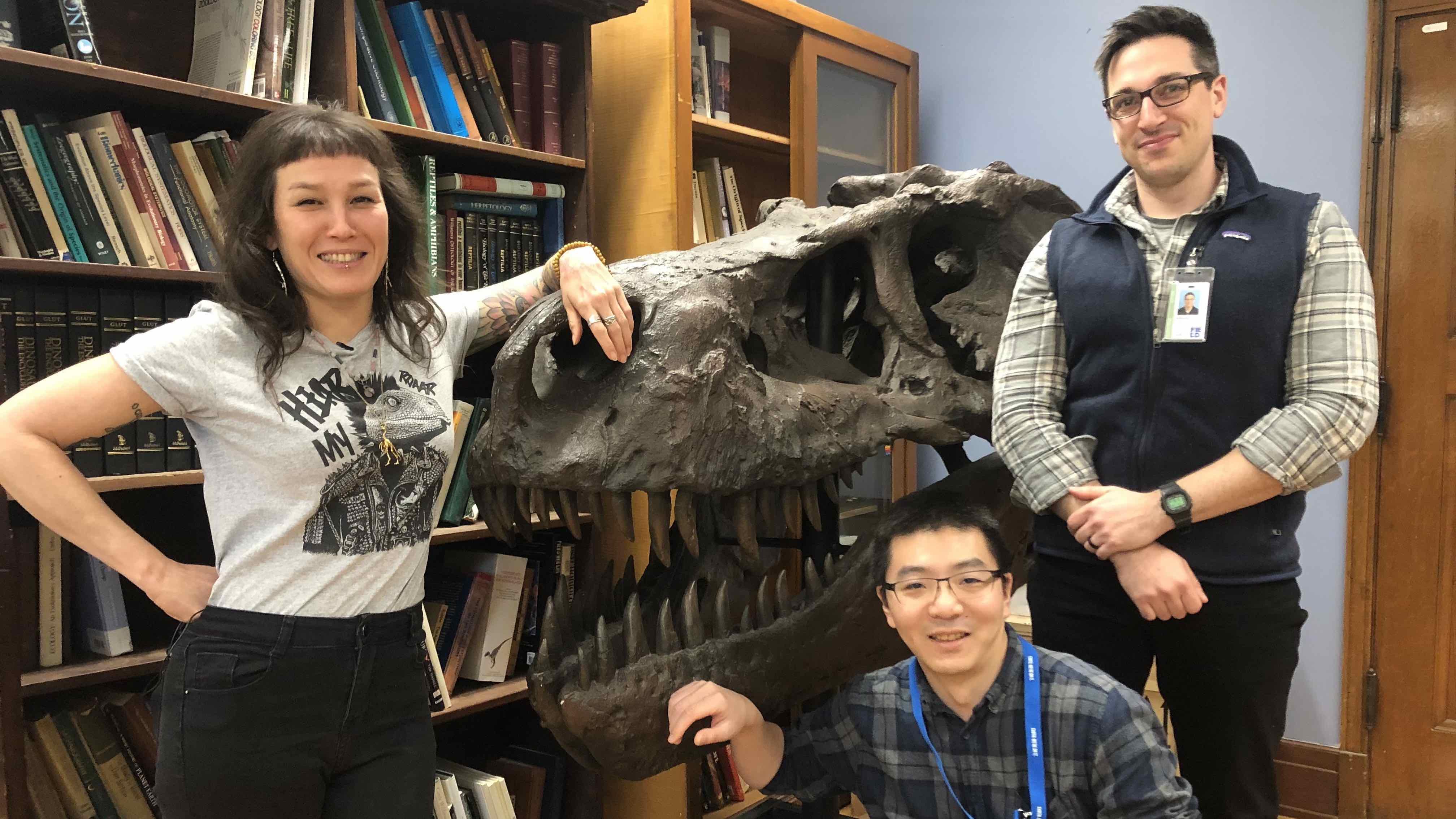 Jingmai O’Connor, left, with lab assistants Pei-Chen Kuo, front, and Alexander Clark. (Patty Wetli / WTTW News)