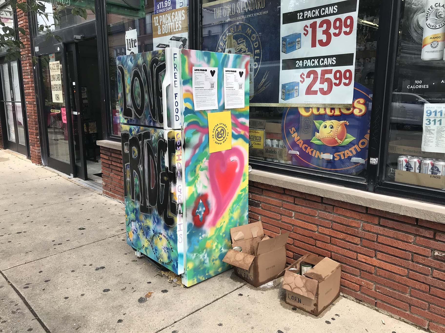 A painted refrigerator in Avondale is part of a two-month old project aimed at helping those in need. (Ariel Parrella-Aureli / WTTW News)