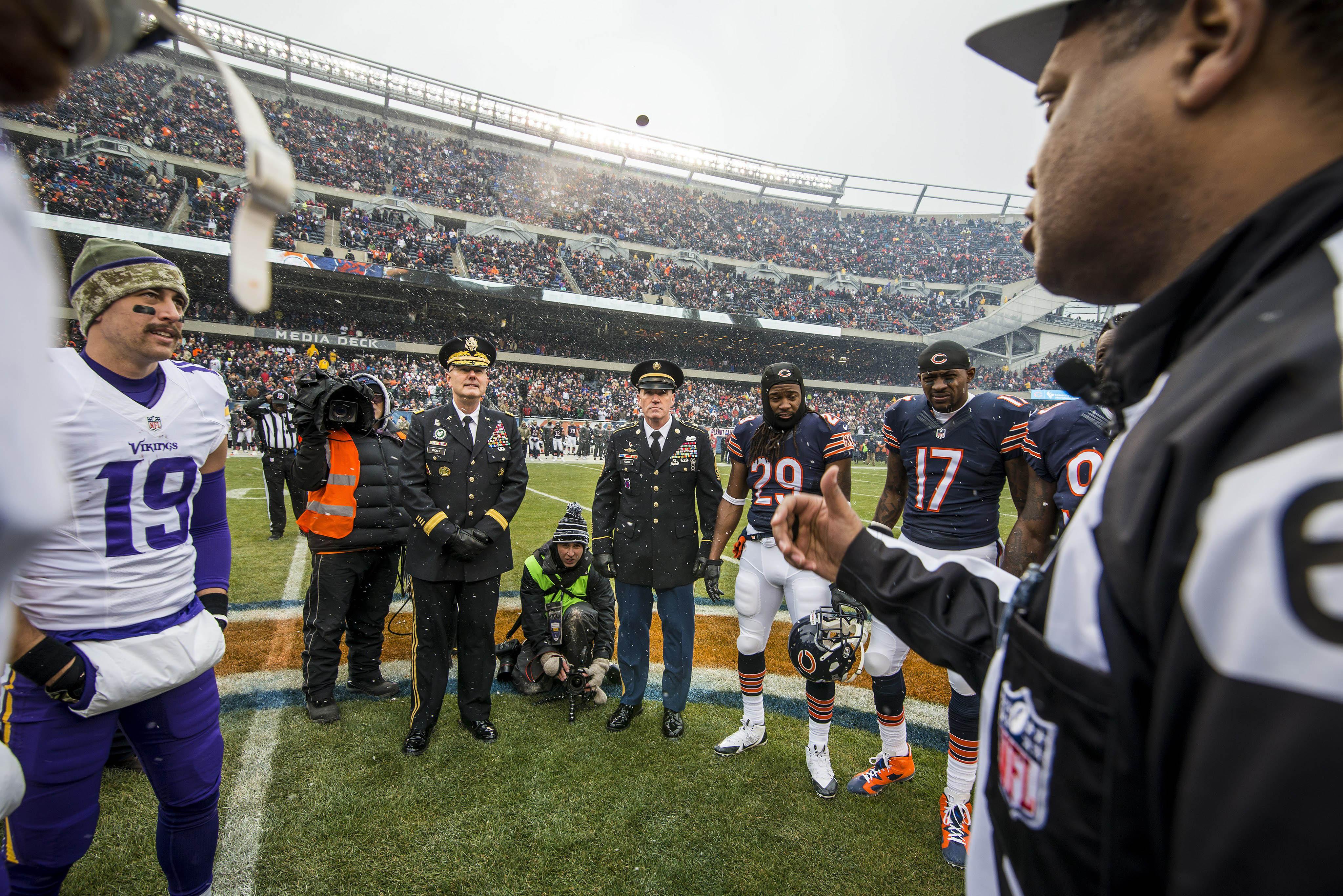 U.S. Army officers oversee a coin toss on Nov. 16, 2014 between the Chicago Bears and Minnesota Vikings at Soldier Field. (U.S. Army photo by Sgt. 1st Class Michel Sauret)