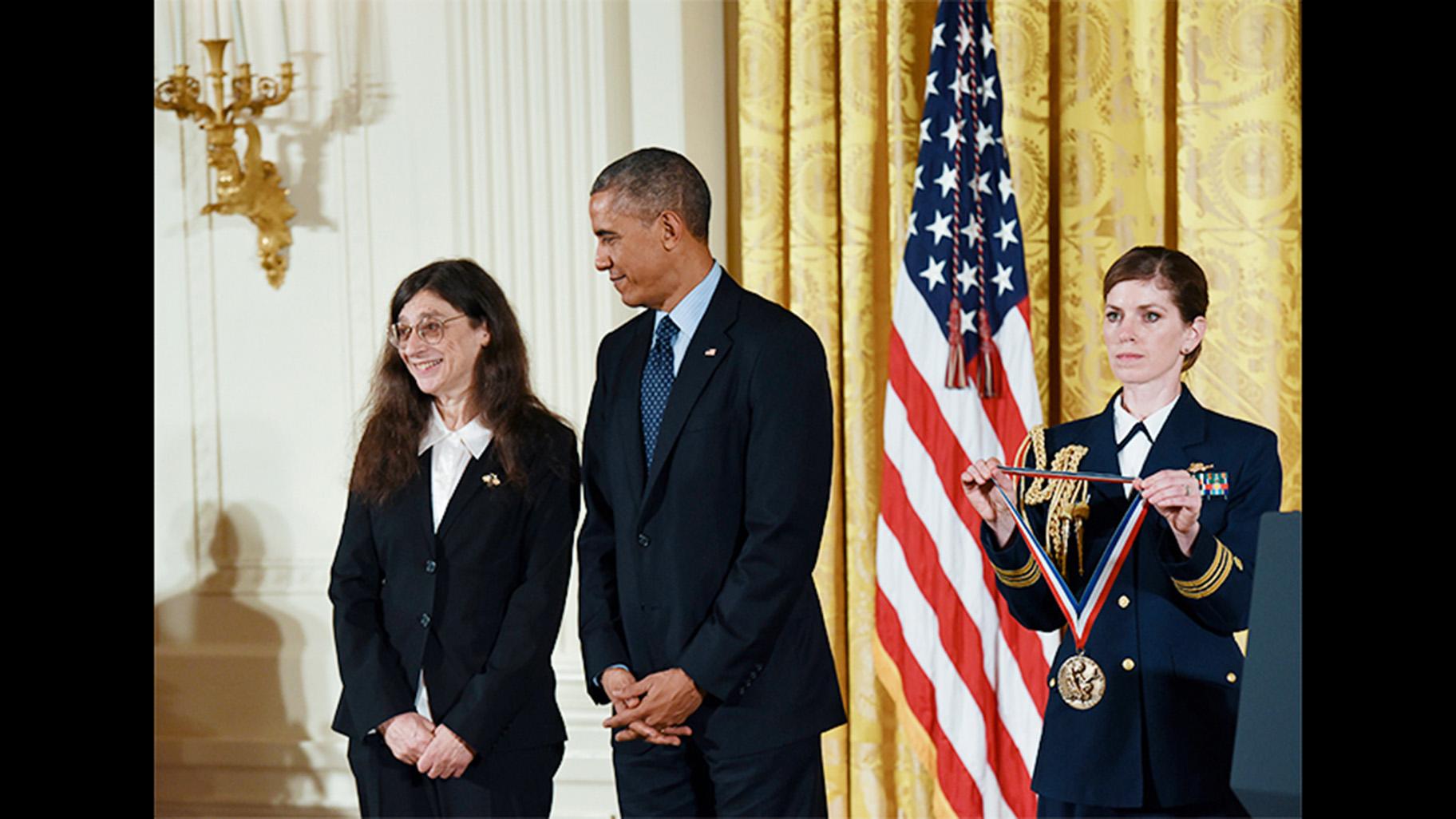 University of Illinois entomology professor May Berenbaum receives a National Medal of Science award from President Barack Obama at a White House ceremony on Nov. 20, 2014. (Courtesy National Science and Technology Medals Foundation) 