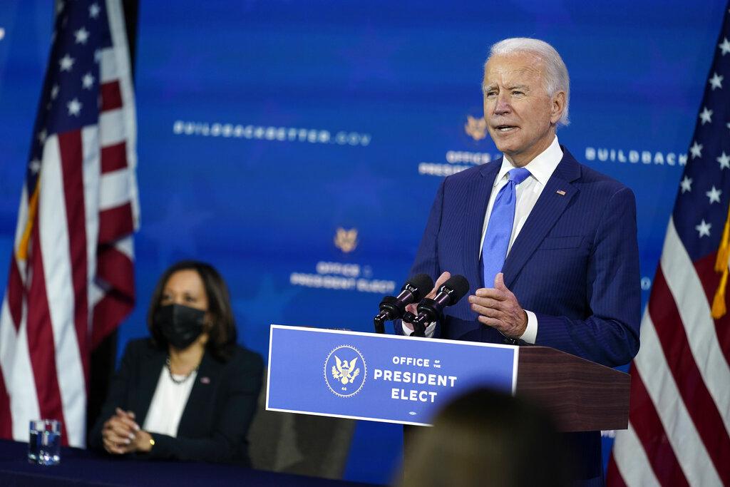 President-elect Joe Biden speaks as Vice President-elect Kamala Harris listens at left, during an event to introduce their nominees and appointees to economic policy posts at The Queen theater, Tuesday, Dec. 1, 2020, in Wilmington, Del. (AP Photo / Andrew Harnik)