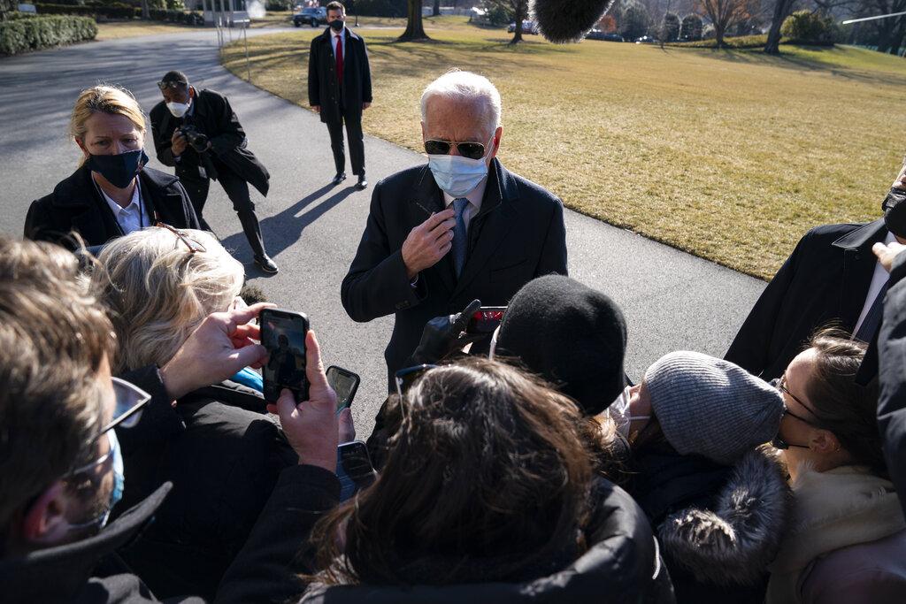President Joe Biden talks with reporters after arriving on the South Lawn of the White House, Monday, Feb. 8, 2021, in Washington. (AP Photo / Evan Vucci)