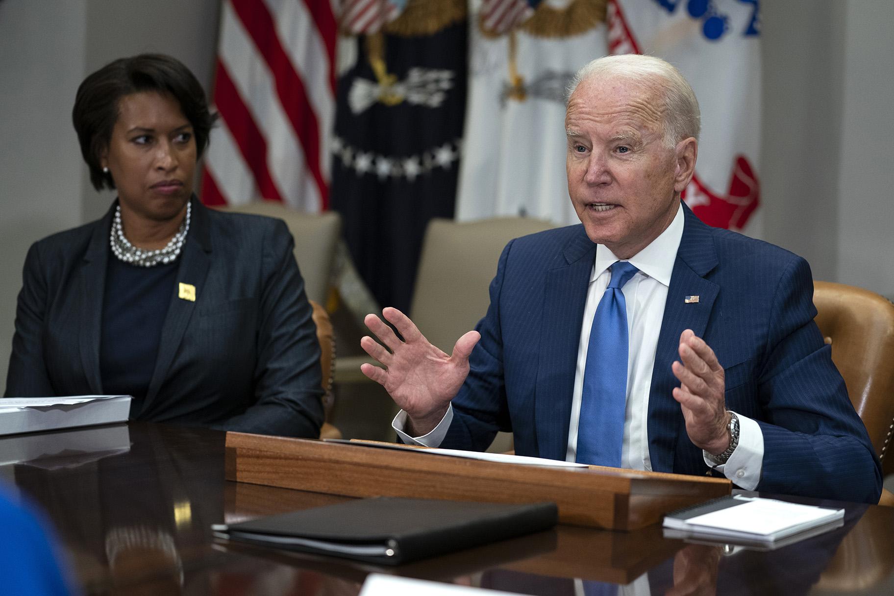 Washington Mayor Muriel Bowser listens as President Joe Biden speaks during a meeting on reducing gun violence, in the Roosevelt Room of the White House, Monday, July 12, 2021, in Washington. (AP Photo / Evan Vucci)