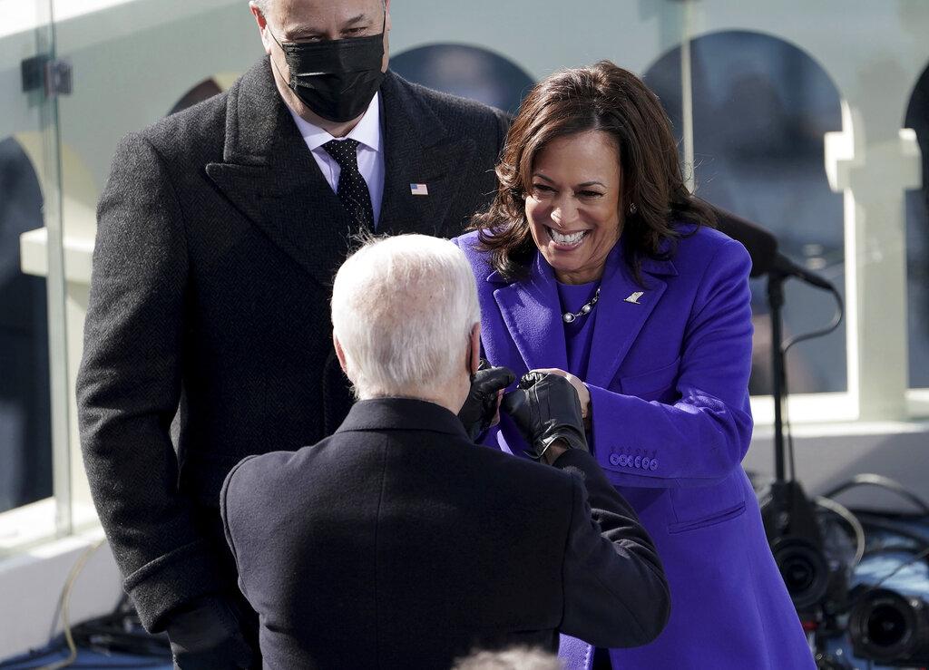 Vice President Kamala Harris bumps fists with President-elect Joe Biden after she was sworn in during the inauguration, Wednesday, Jan. 20, 2021, at the U.S. Capitol in Washington. (Greg Nash / Pool Photo via AP)