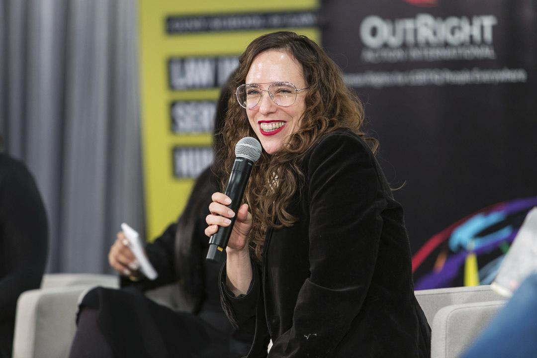 In this Dec. 7, 2019 photo provided by Brad Hamilton, Jessica Stern, head of Outright International, speaks during the OutSummit in New York. (Brad Hamilton / OutRight Action International via AP)