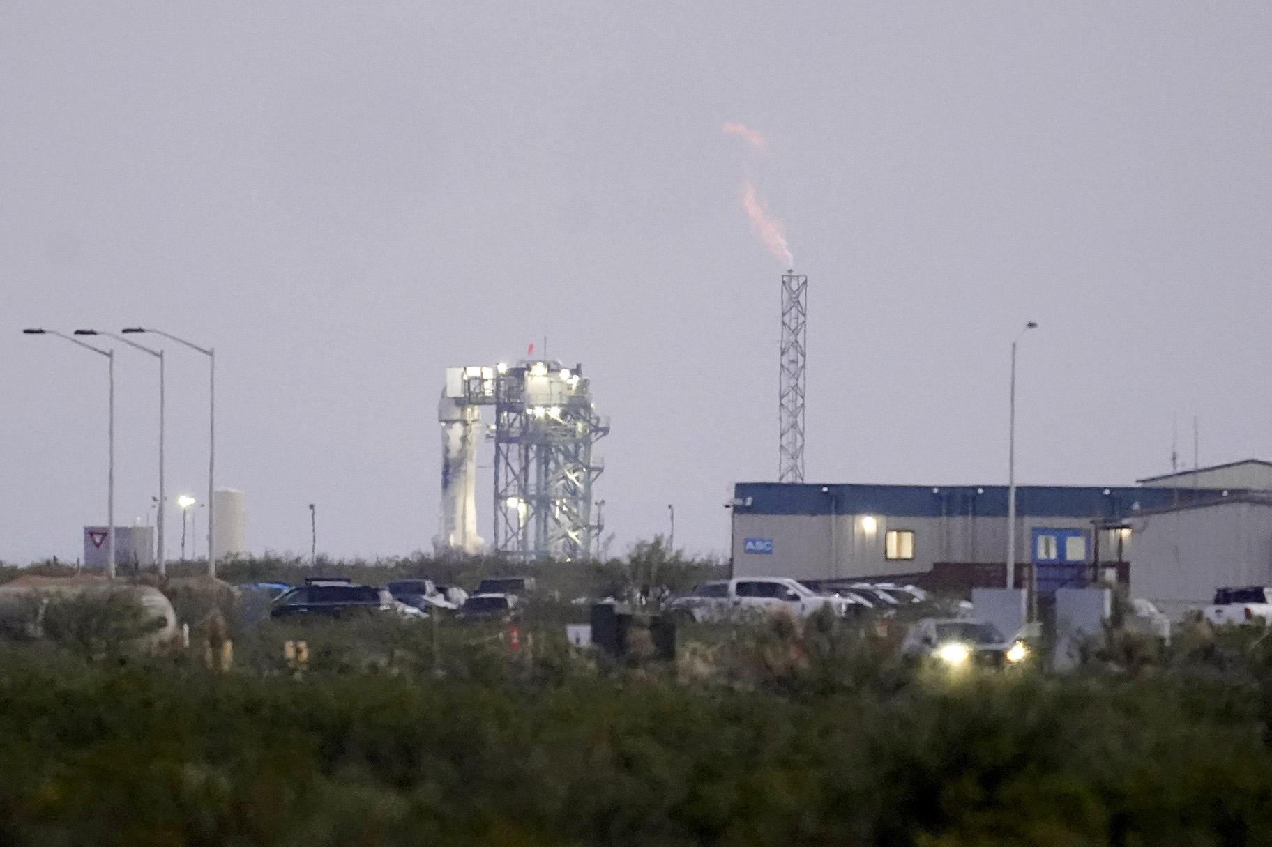 Blue Origin’s New Shepard rocket sits on a spaceport launch pad near Van Horn, Texas, Tuesday, July 20, 2021. (AP Photo / Tony Gutierrez)