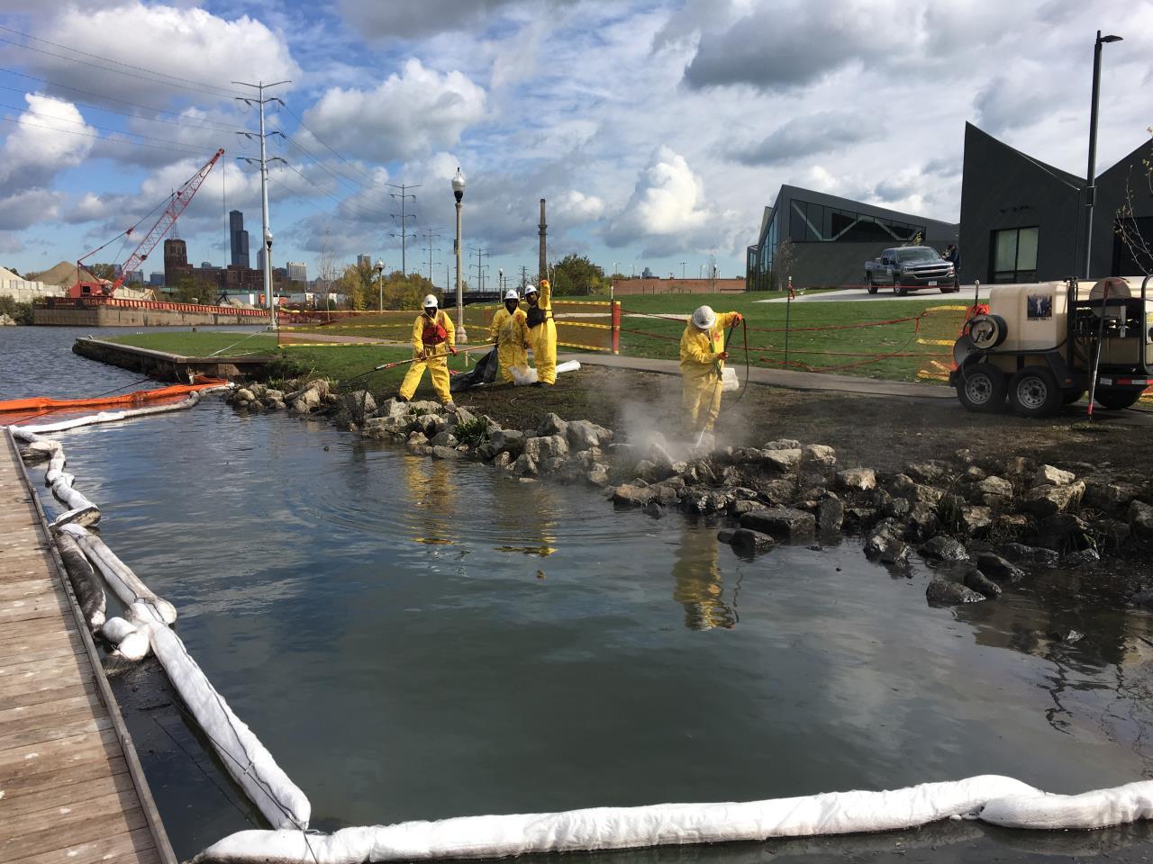 Workers from the Environmental Protection Agency respond to an oil spill that was reported Oct. 26 at a fork of the Chicago River known as Bubbly Creek. (EPA)