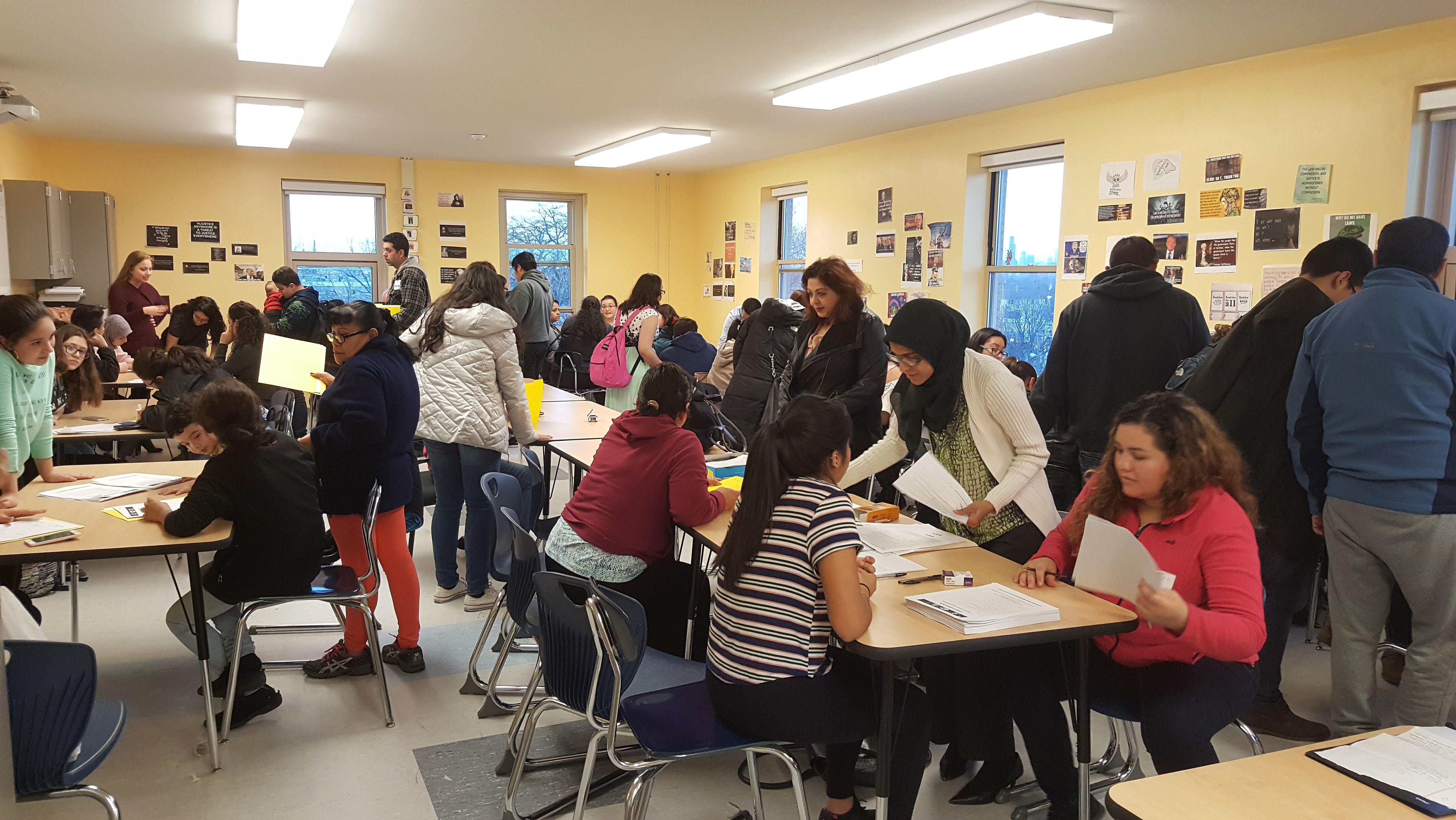 Twenty-seven families gathered together at the John Hancock High School in early March to attend an emergency family planning workshop. (Courtesy of  Antonio Gutierrez)