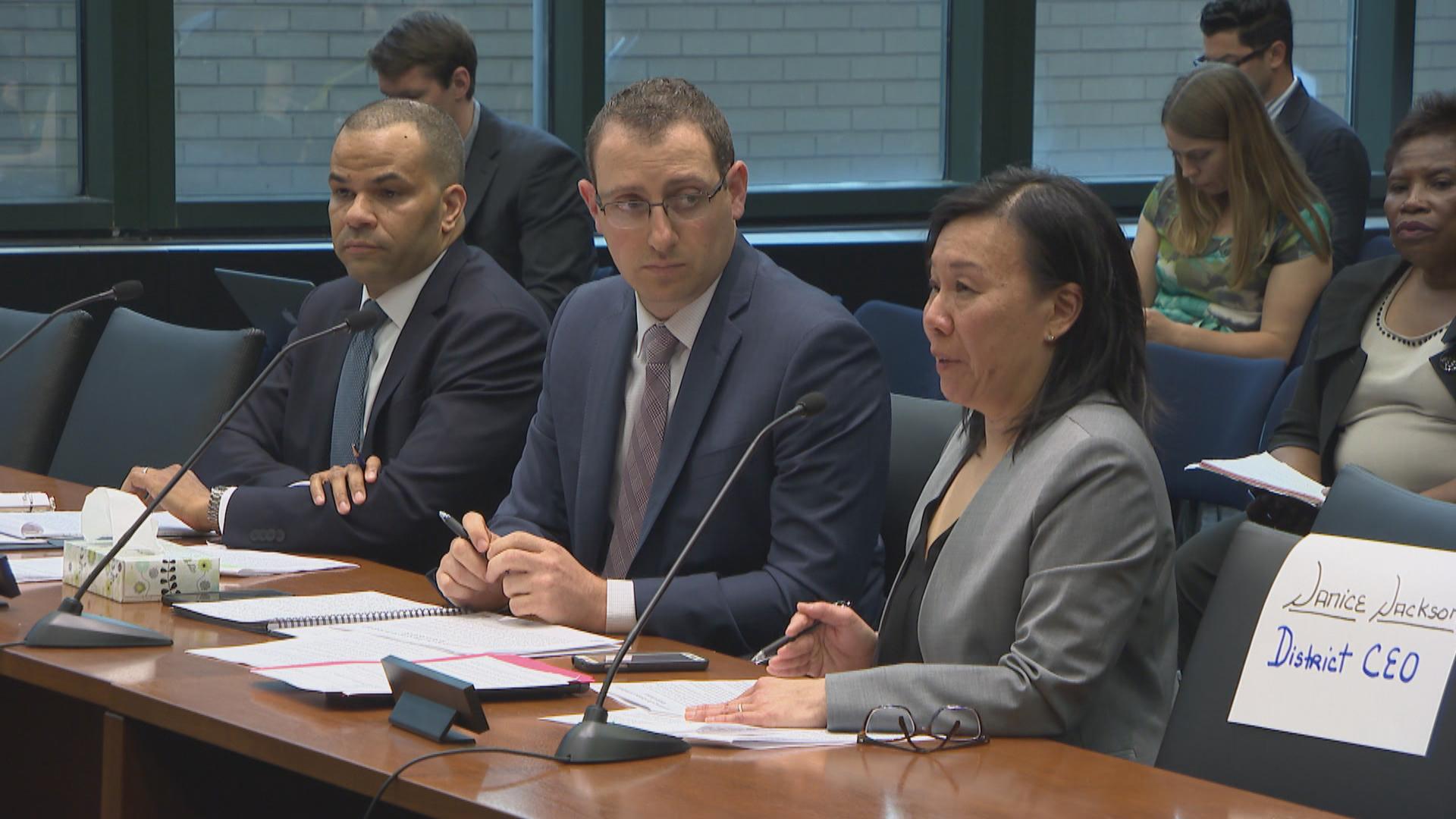 CPS officials Doug Henning, left, Matt Lyons, center, and Jadine Chou attend a hearing Wednesday, June 20, 2018.