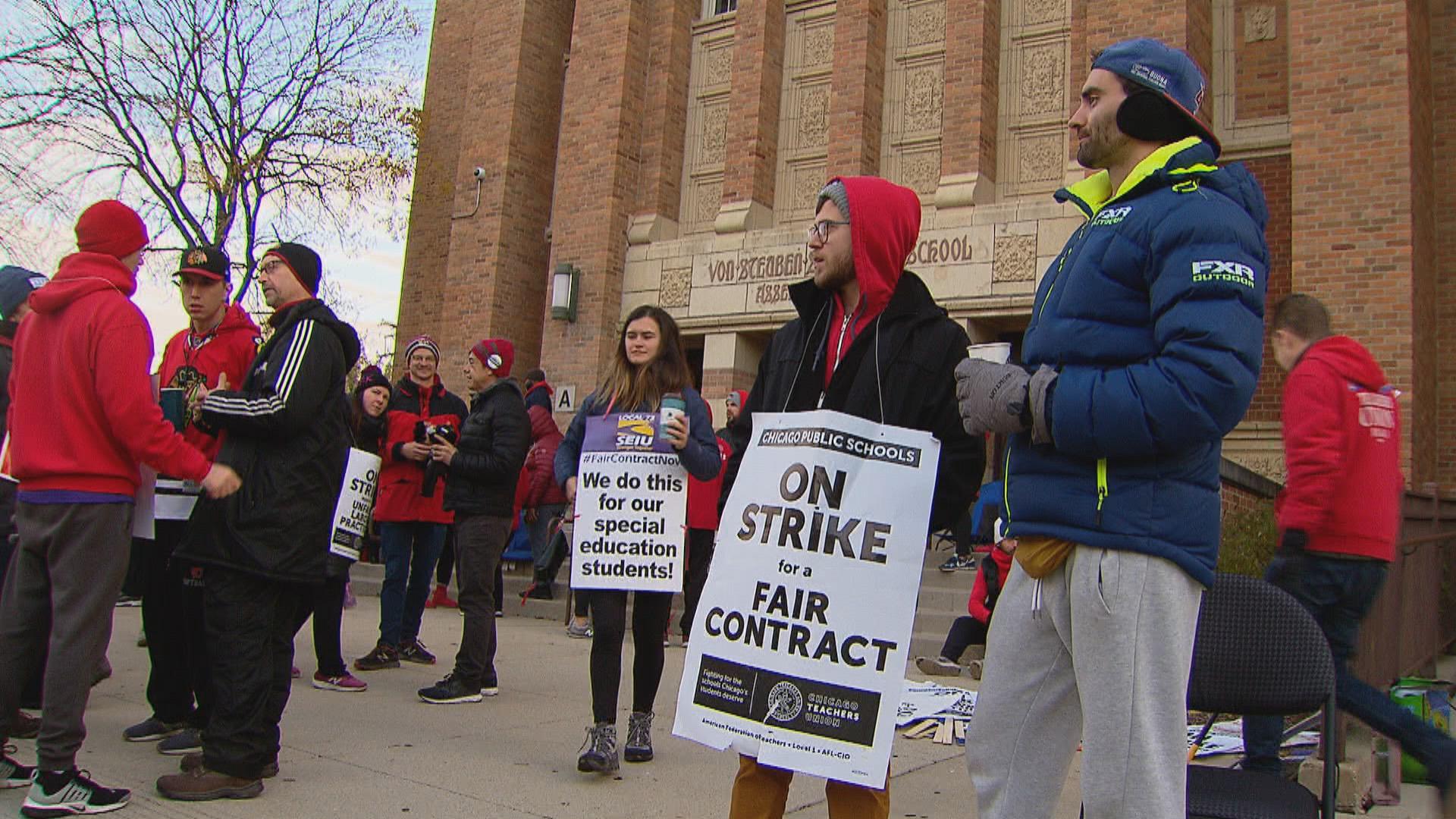 Striking teachers at Chicago Public Schools gather outside a CPS school on the city’s North Side on Monday, Oct. 28, 2019, day eight of the Chicago teachers strike. (WTTW News)