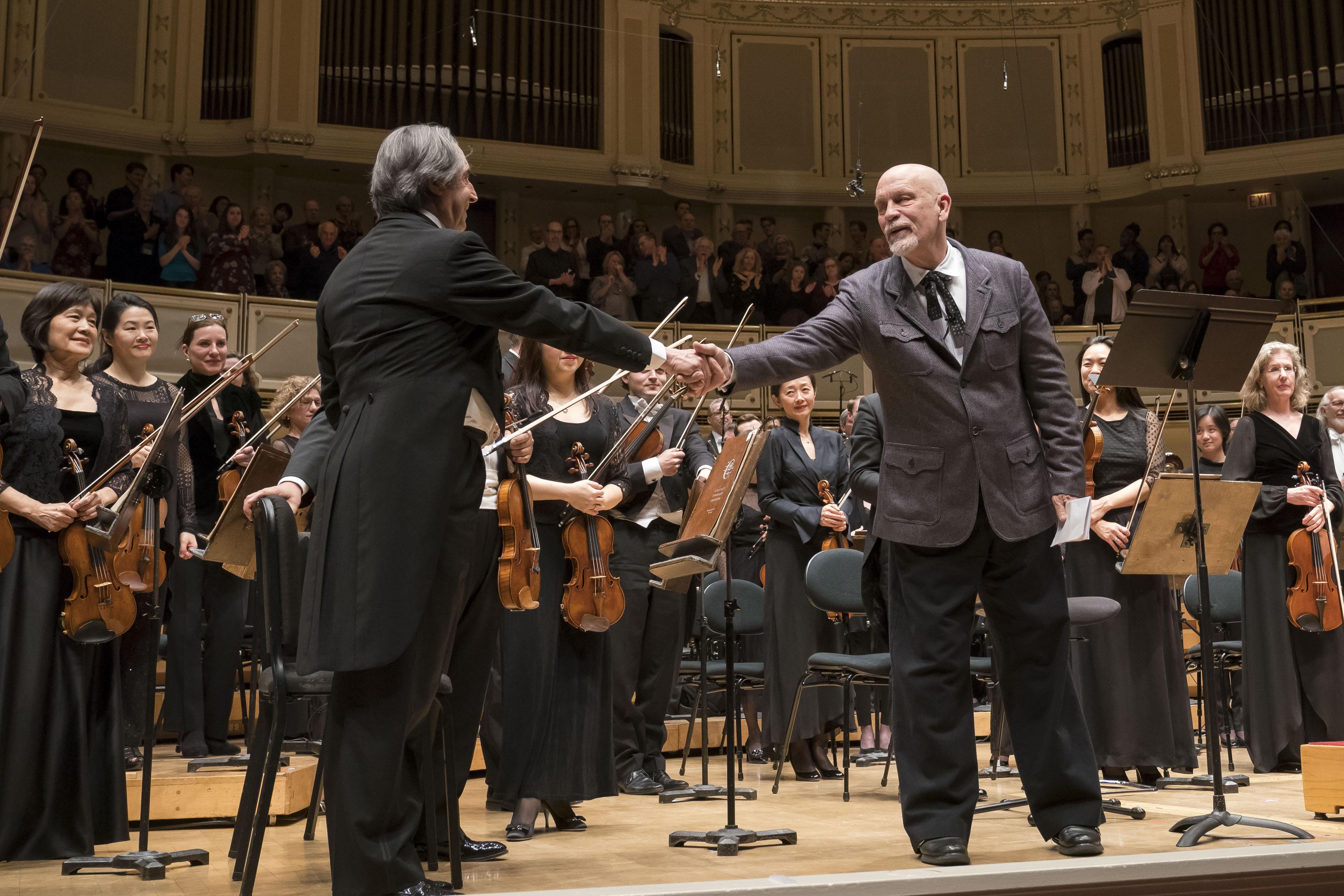 Zell Music Director Riccardo Muti congratulates John Malkovich following their performance of Copland’s “Lincoln Portrait” with the CSO. (Photo © Todd Rosenberg)