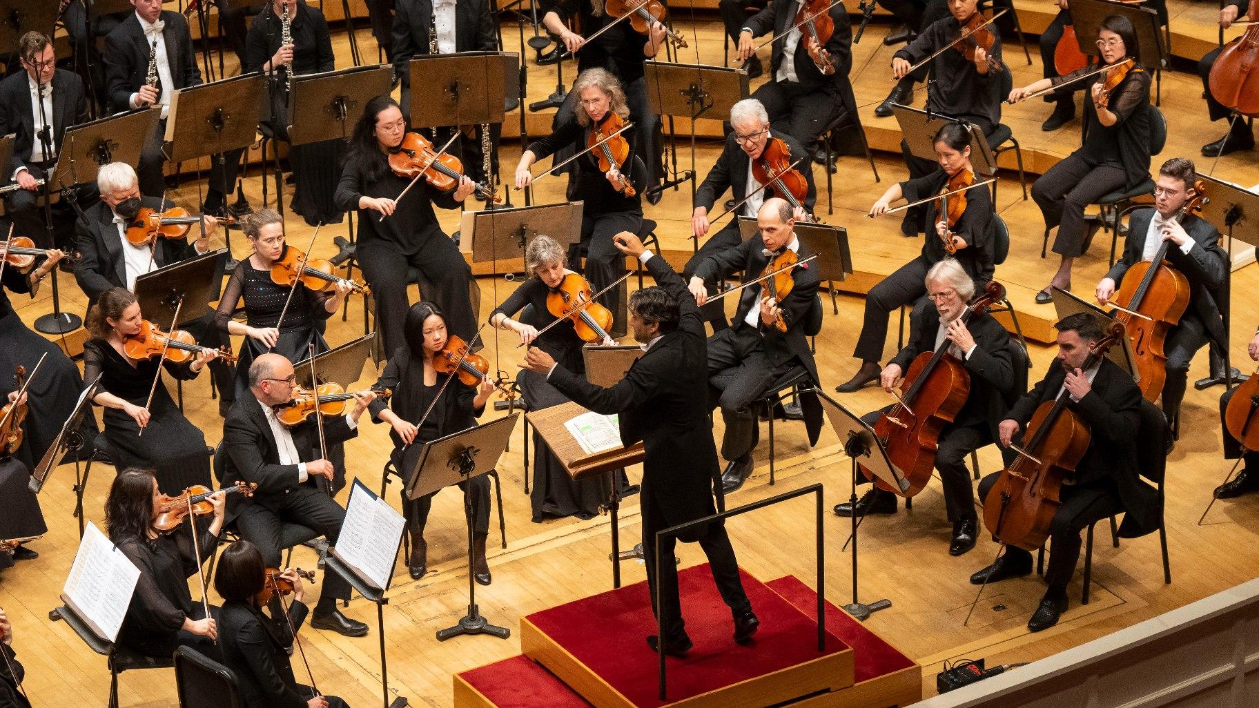 Guest conductor David Afkham leads the Chicago Symphony Orchestra in a program of works by Ravel, Shostakovich, and Debussy. (Credit: Todd Rosenberg)