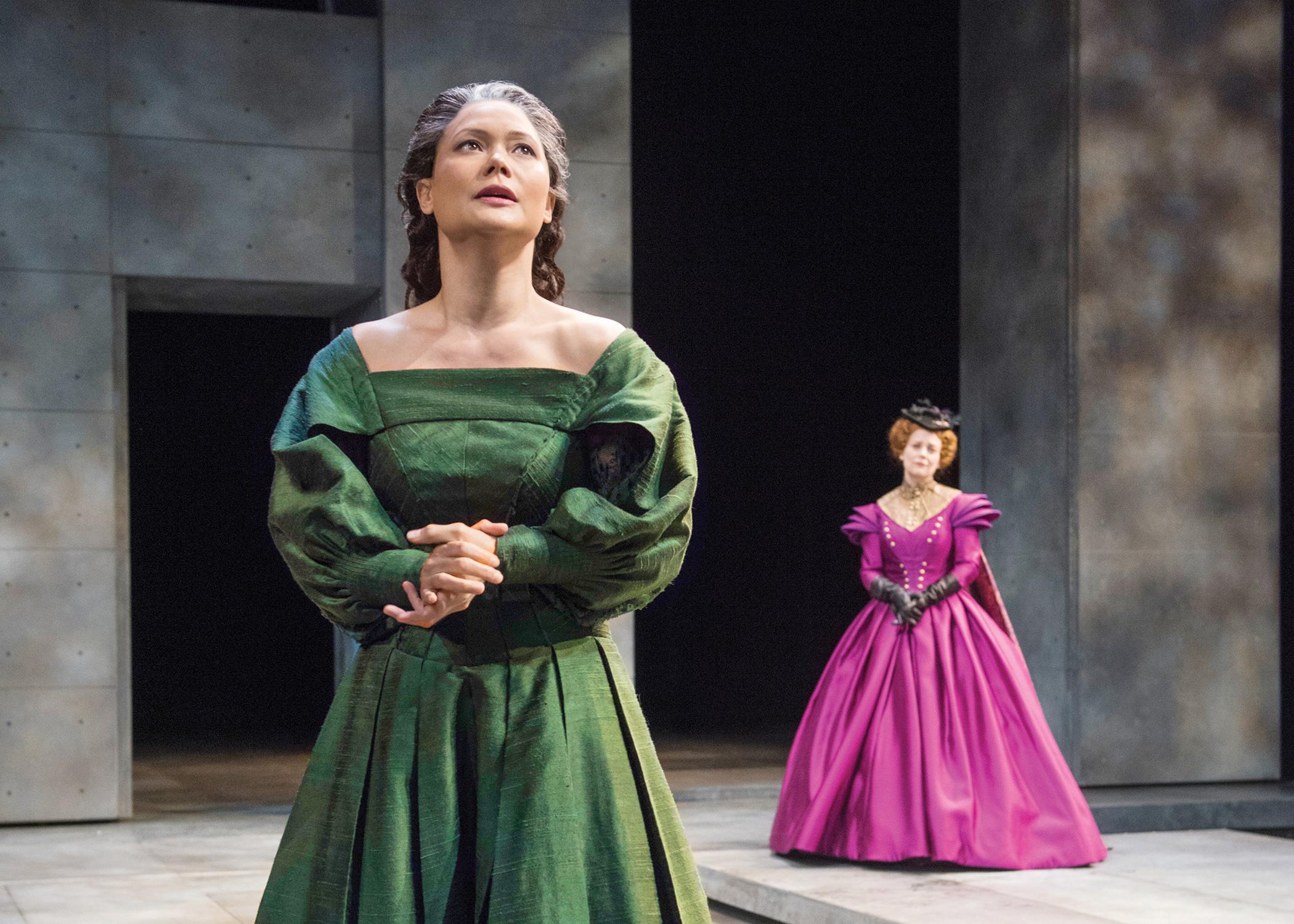 Mary Stuart (K.K. Moggie) implores her cousin Queen Elizabeth I (Kellie Overbey) to release her from her imprisonment in Chicago Shakespeare Theater’s production of “Schiller’s Mary Stuart.” (Credit: Michael Brosilow)