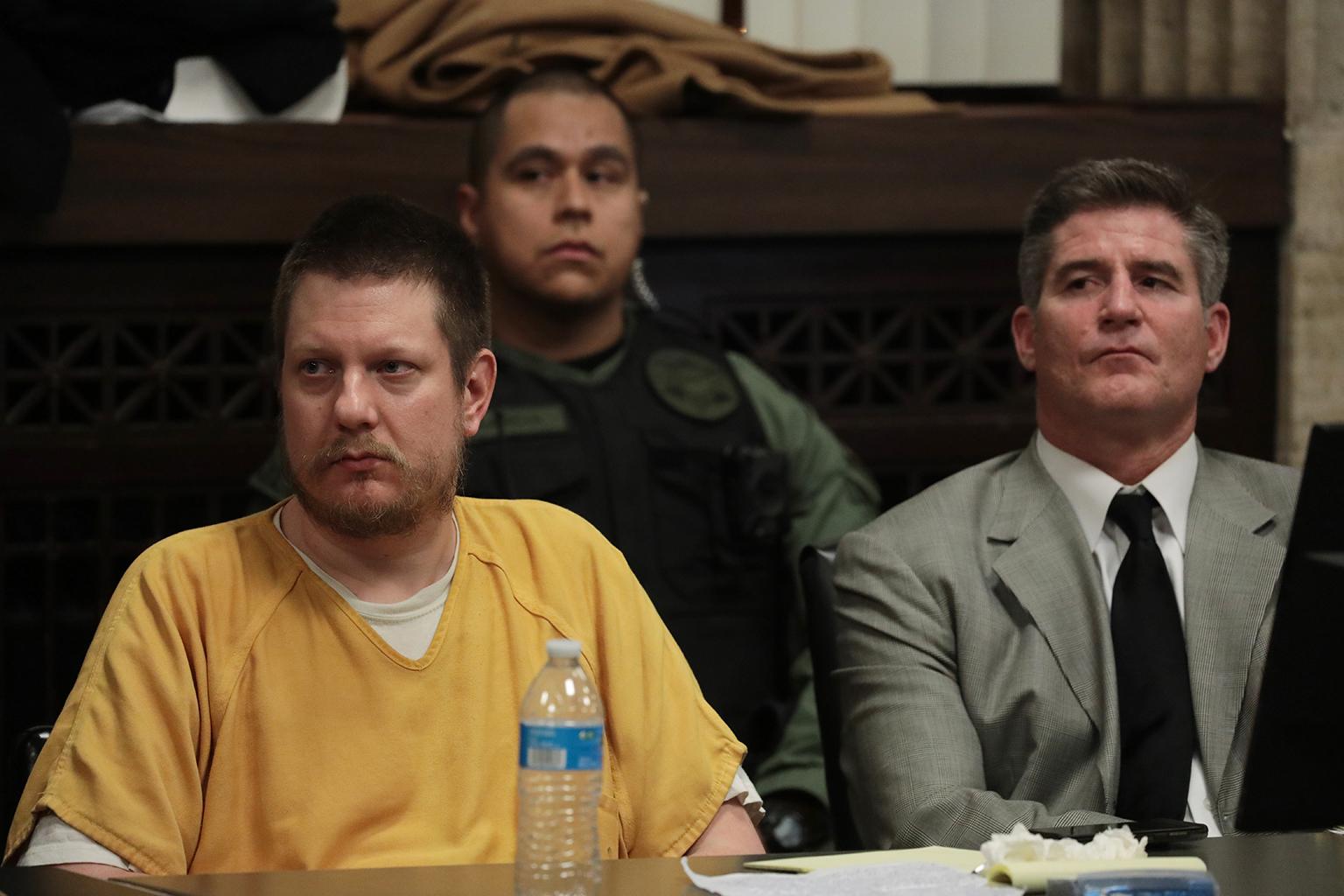 Former Chicago police Officer Jason Van Dyke and his attorney Daniel Herbert, right, listen as the judge describes how he’ll be sentenced on Friday, Jan. 18, 2019. (Antonio Perez / Chicago Tribune / Pool)