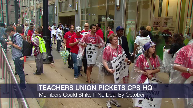 Chicago Teachers Union members protest outside of a CPS Board of Education meeting on Aug. 24. 