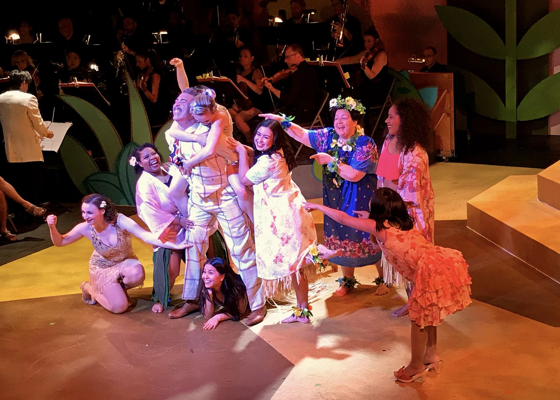 From left: Sarah Ruth Mikulski, Cydney Washington, William Roberts, Clara Imon Pedtke, Elena Avila, Rose Guccione, Ysaye McKeever and Angela Yu in “The Flower of Hawaii.” (Courtesy of Folks Operetta)