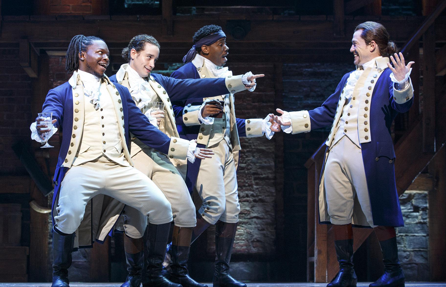 From left: Chris De’Sean Lee, Jose Ramos, Wallace Smith and Miguel Cervantes in “Hamilton.” (Courtesy of Joan Marcus)