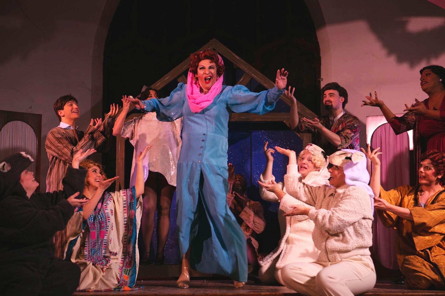 David Cerda (center) and the cast of Hell in a Handbag Productions’ holiday favorite “Christmas Dearest.” (Photo by Rick Aguilar Studios)