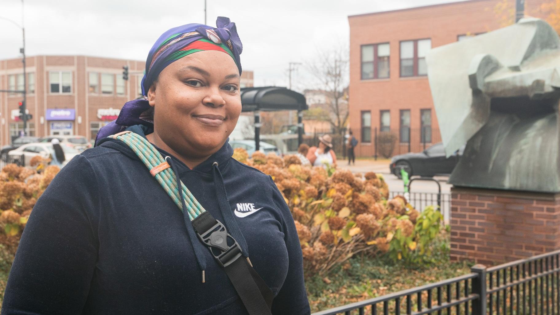 Bronzeville resident Cinthia Sullivan, 25, outside the Dr. Martin Luther King Community Service Center polling place in Chicago on Nov. 5, 2024. (Michael Izquierdo / WTTW News)
