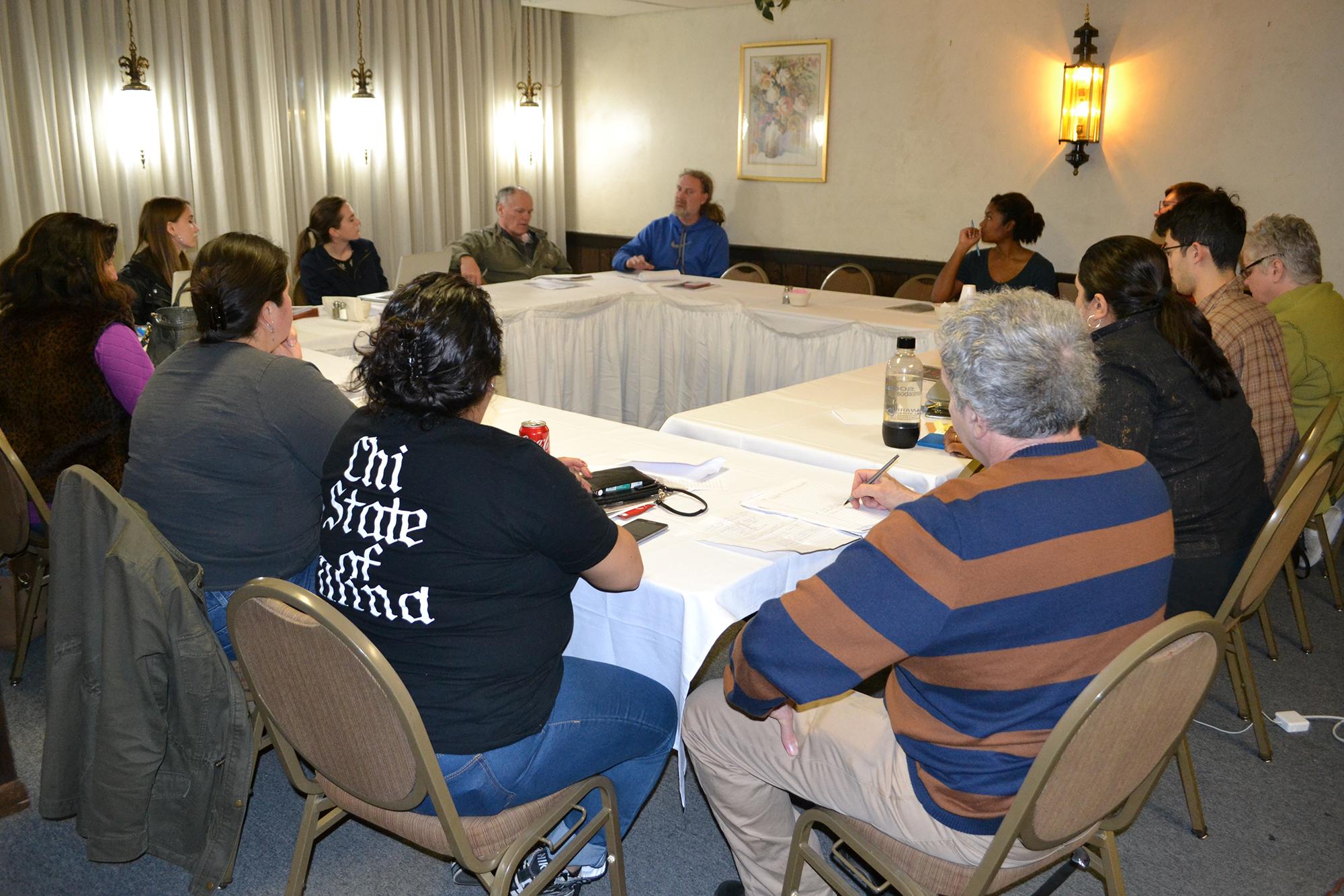 Members of the Southeast Side Coalition to Ban Petcoke met Tuesday to discuss potential health risks from newly discovered manganese dust. (Alex Ruppenthal / Chicago Tonight)