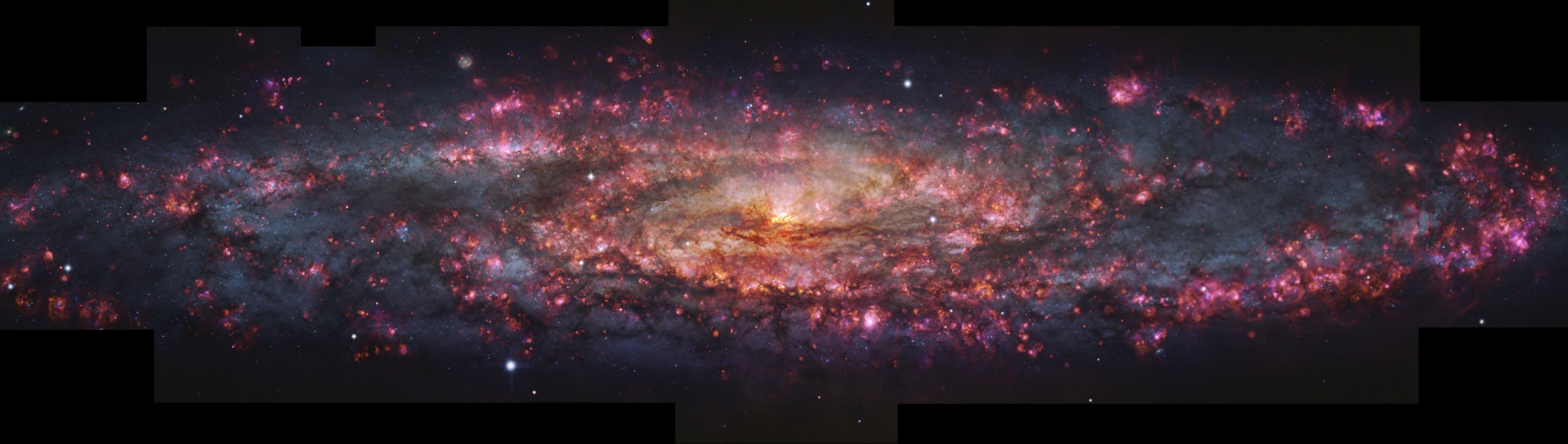 This handout provided by the European Southern Observatory shows a detailed, thousand-colour image of the Sculptor Galaxy captured with the MUSE instrument at ESO's Very Large Telescope (VLT). (ESO via AP)