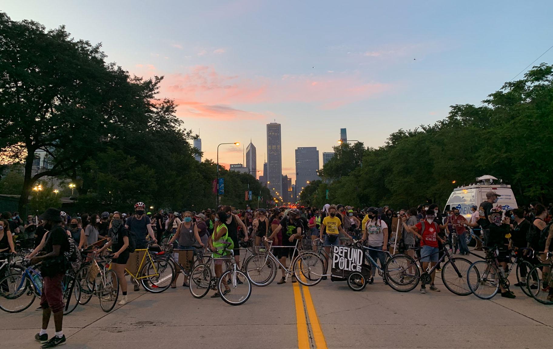 Protesters, many of them with bicycles, at a July 17 demonstration in Grant Park. (Grace Del Vecchio / WTTW News)
