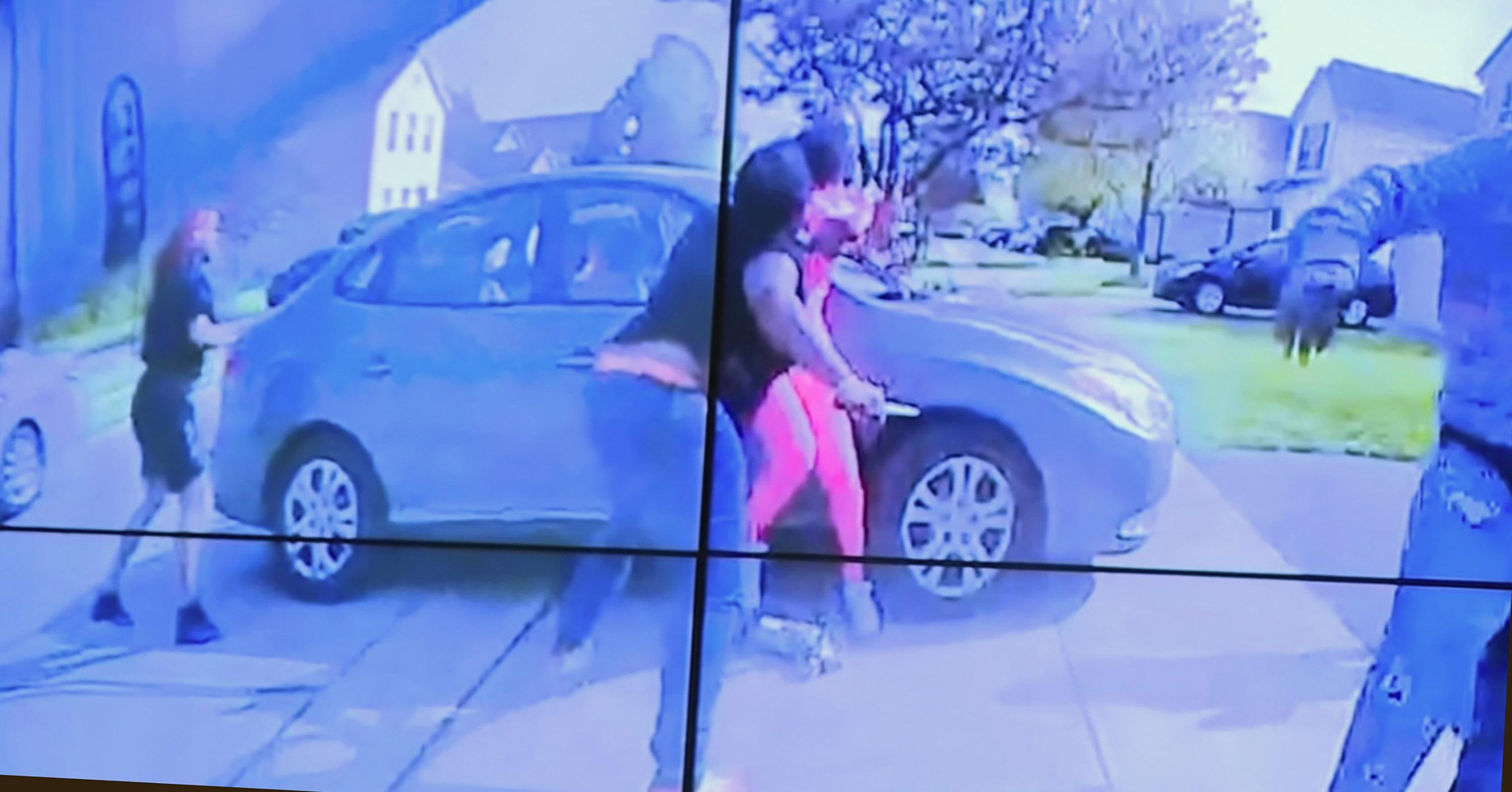 In an image from police body camera video that the Columbus Police Department played during a news conference Tuesday night, April 20, 2021, a teenage girl, foreground, appears to wield a knife during an altercation before being shot by a police officer Tuesday, April 20, 2021, in Columbus, Ohio. (Columbus Police Department via WSYX-TV via AP)