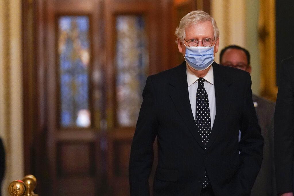 In this Jan. 6, 2021, photo, Senate Majority Leader Mitch McConnell of Ky., walks from the Senate floor to his office on Capitol Hill in Washington. (AP Photo / Manuel Balce Ceneta)