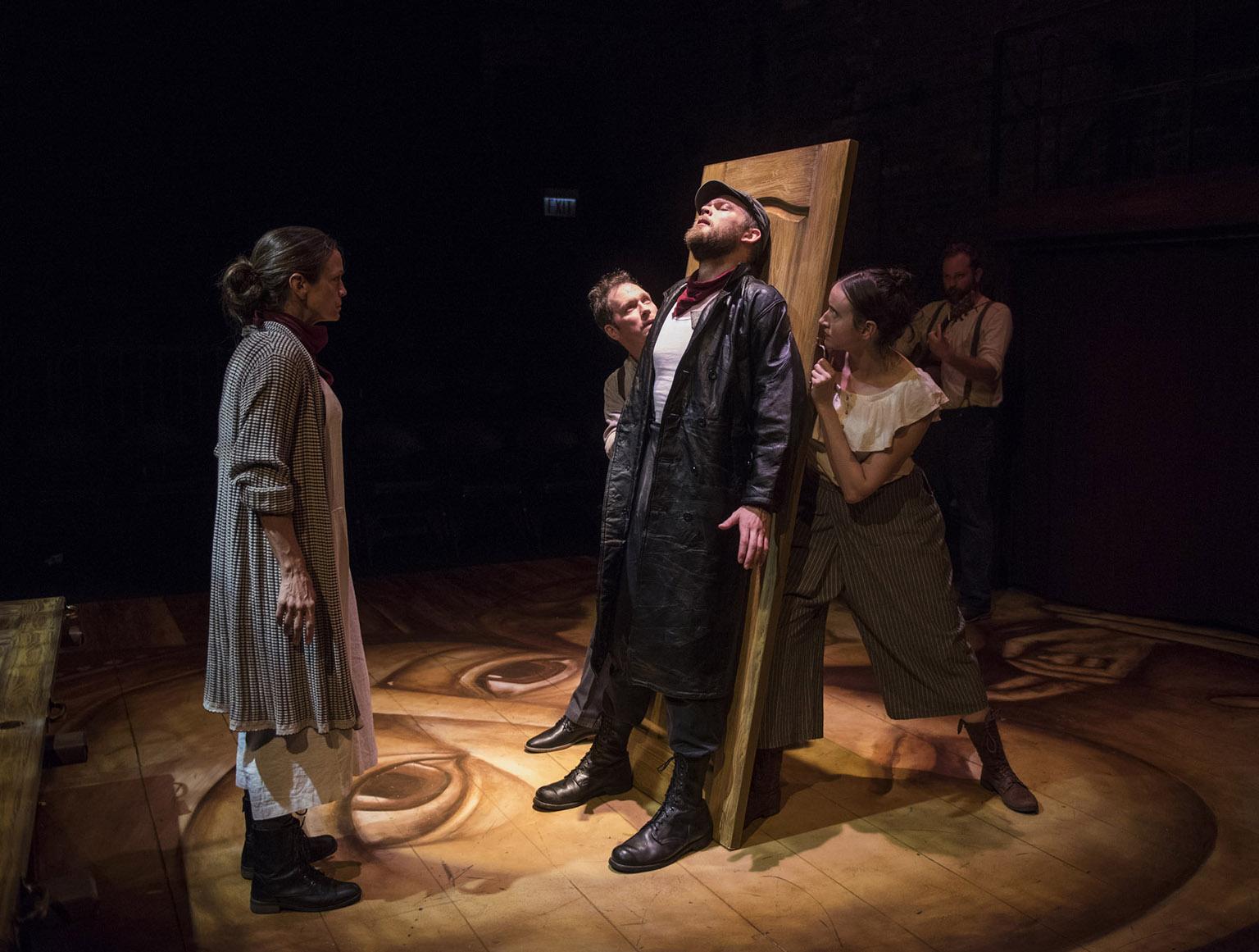 (From left) Rebecca Jordan, Brad Woodard, Drew Schad, Christina Gorman and Joseph Wiens in Shattered Globe Theatre’s new adaptation of “Crime and Punishment.” (Photo by Michael Brosilow)