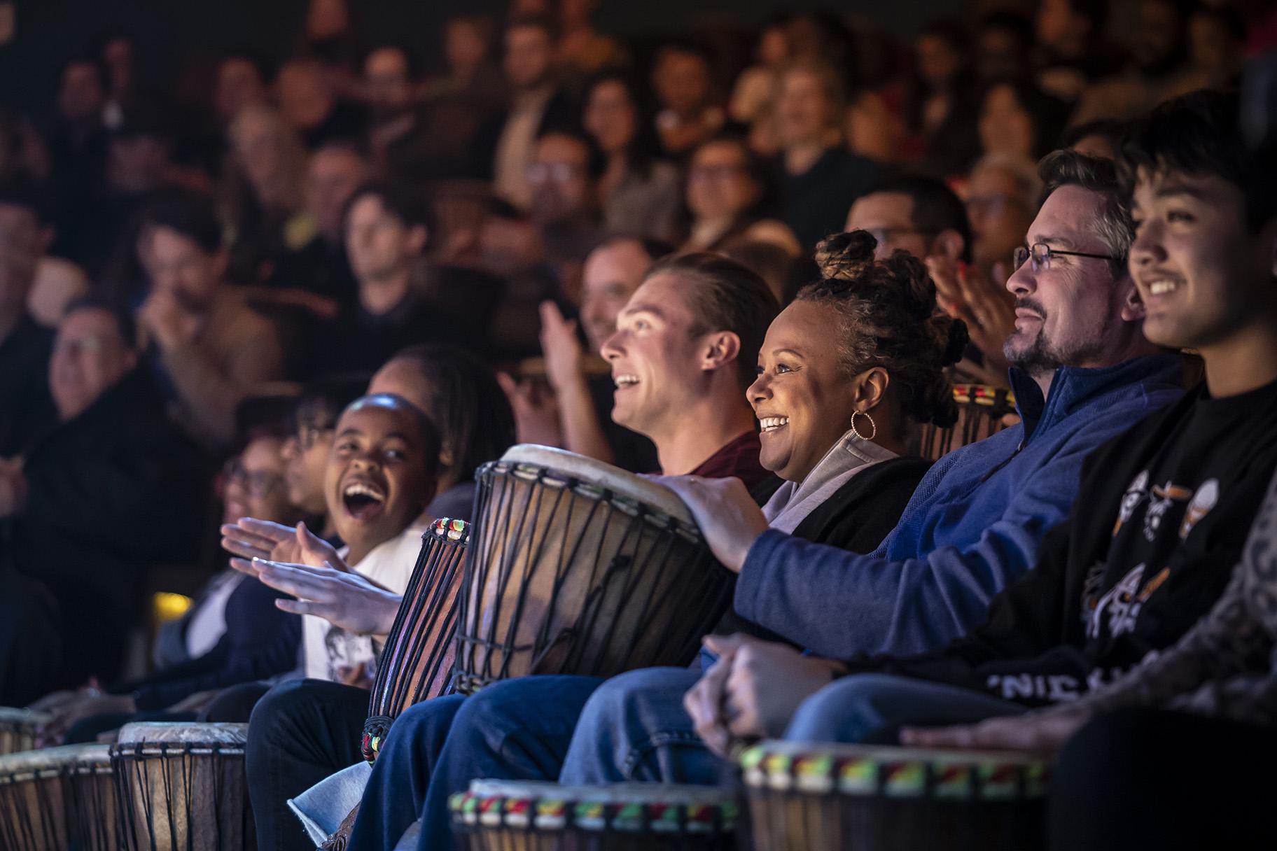 “Djembe!” front-row audience. (Credit: Liz Lauren)