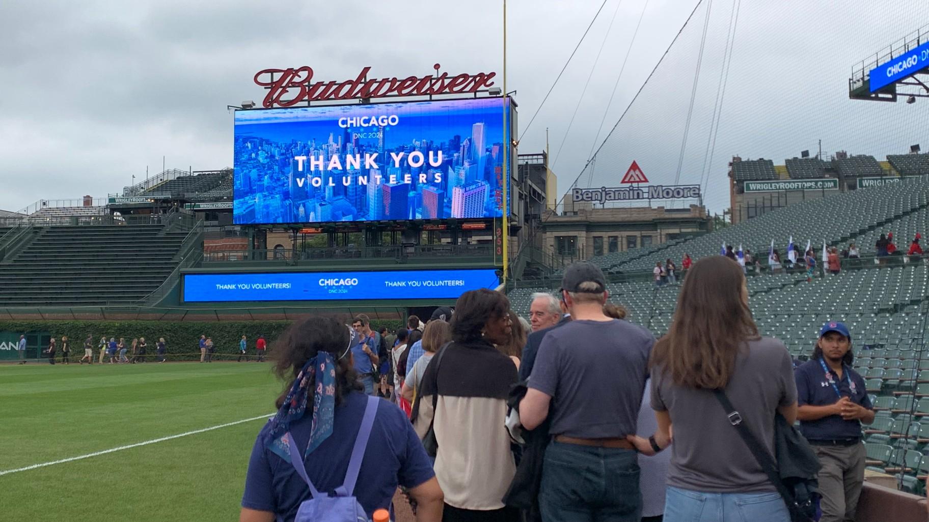 DNC volunteers gather at Wrigley Field for a volunteer appreciation rally on Aug. 15, 2024. (Eunice Alpasan / WTTW News)