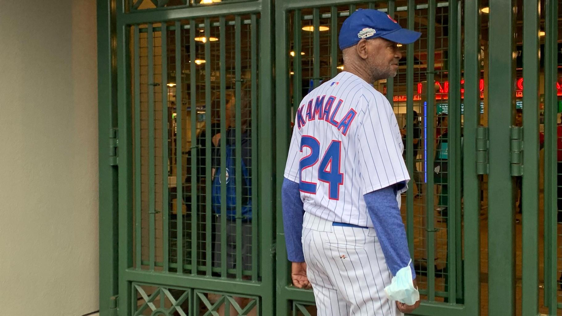 Longtime Chicago Cubs fan and local celebrity Ronnie “Woo Woo” Wickers makes an appearance in a Kamala Harris jersey at Wrigley Field on Aug. 15, 2024. (Eunice Alpasan / WTTW News)