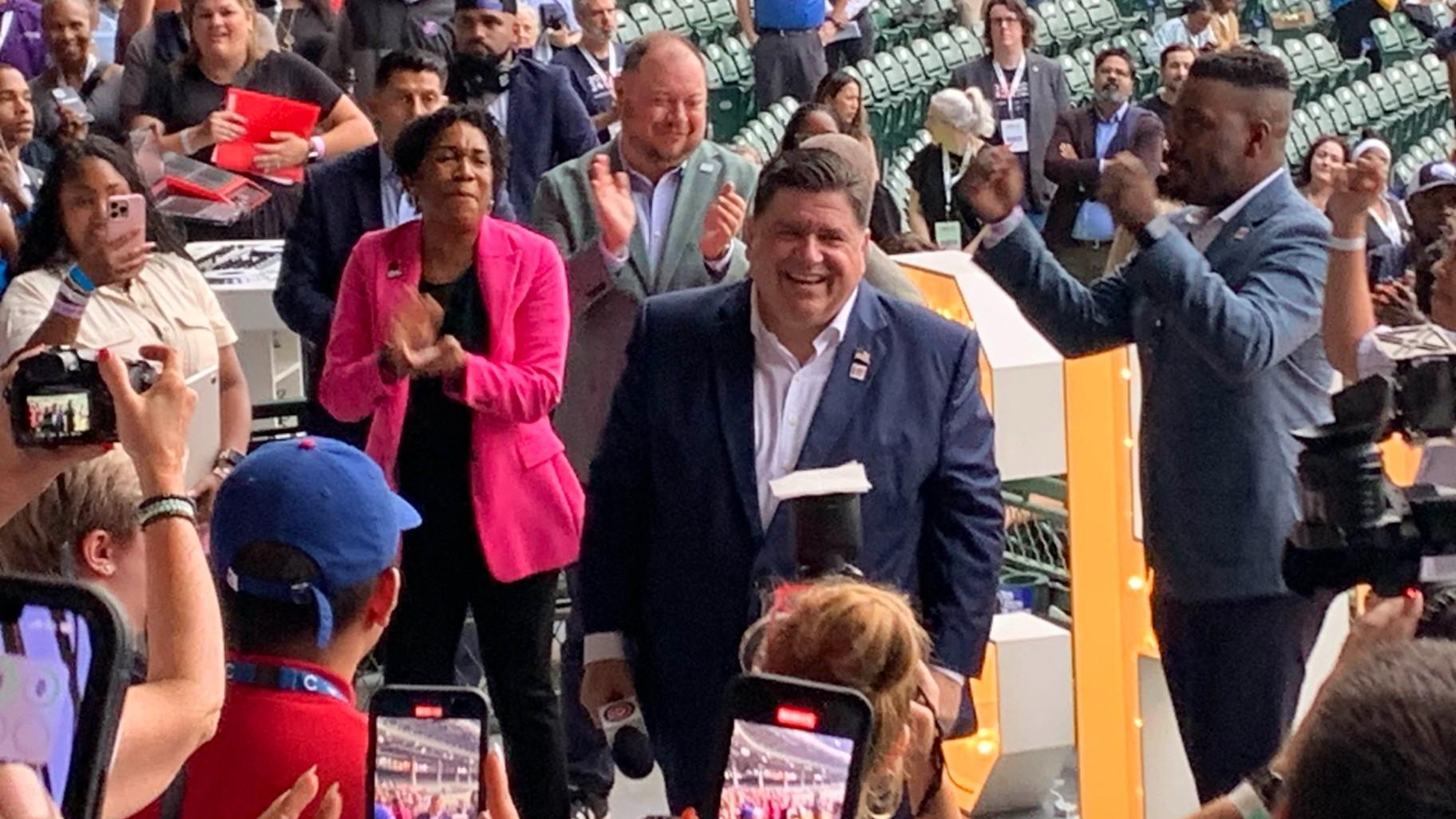 Illinois Gov. J.B. Pritzker speaks to DNC volunteers at Wrigley Field on Aug. 15, 2024. (Eunice Alpasan / WTTW News)