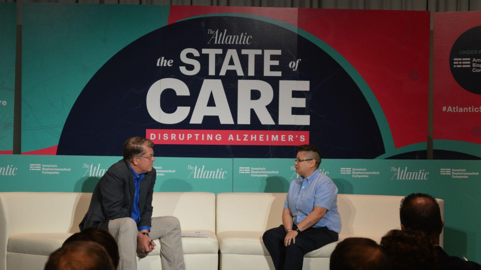 The Atlantic’s Steve Clemons, left, speaks with Daisy Duarte about her experience working as a caregiver for her mother, who was diagnosed with Alzheimer’s disease. (Kristen Thometz / Chicago Tonight)