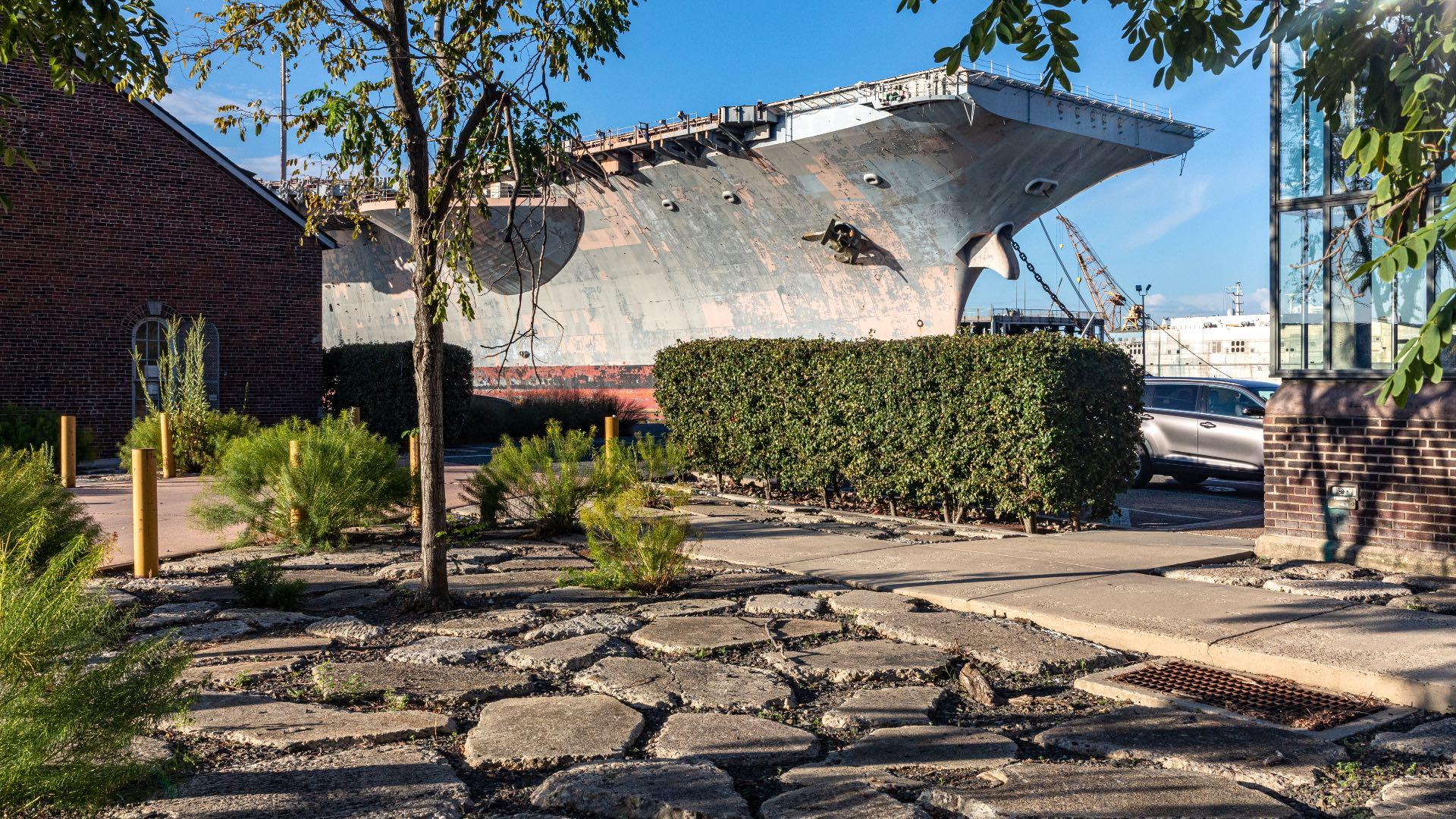 The Urban Outfitters campus in Philadelphia shows another creative example of depaving. Community-level projects can draw on these innovative techniques at a smaller scale. (Barry Doherty / Courtesy of The Cultural Landscape Foundation)  