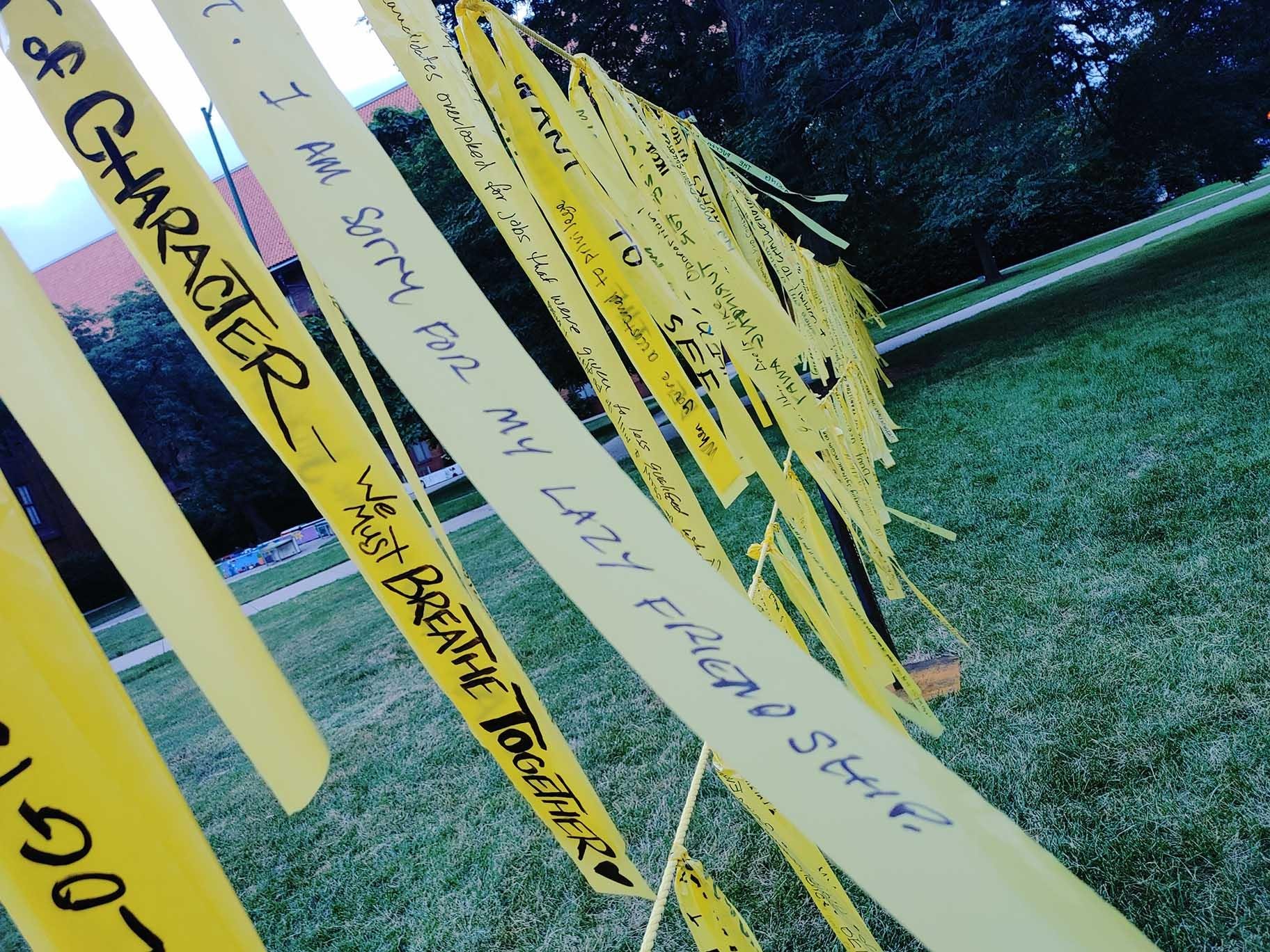 The installation “Dirty Laundry” on the lawn at Schurz High School. (Erica Gunderson / WTTW News)