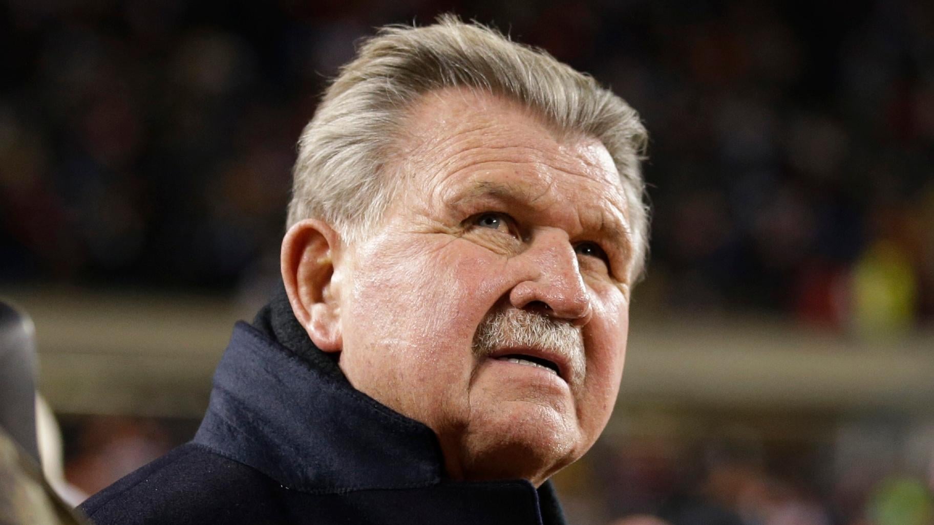 FILE - Former Chicago Bears player and football coach Mike Ditka waits for the halftime ceremony where his No. 89 was to be retired by the Bears during an NFL football game between the Bears and the Dallas Cowboys, Monday, Dec. 9, 2013, in Chicago. (AP Photo / Nam Y. Huh, File)