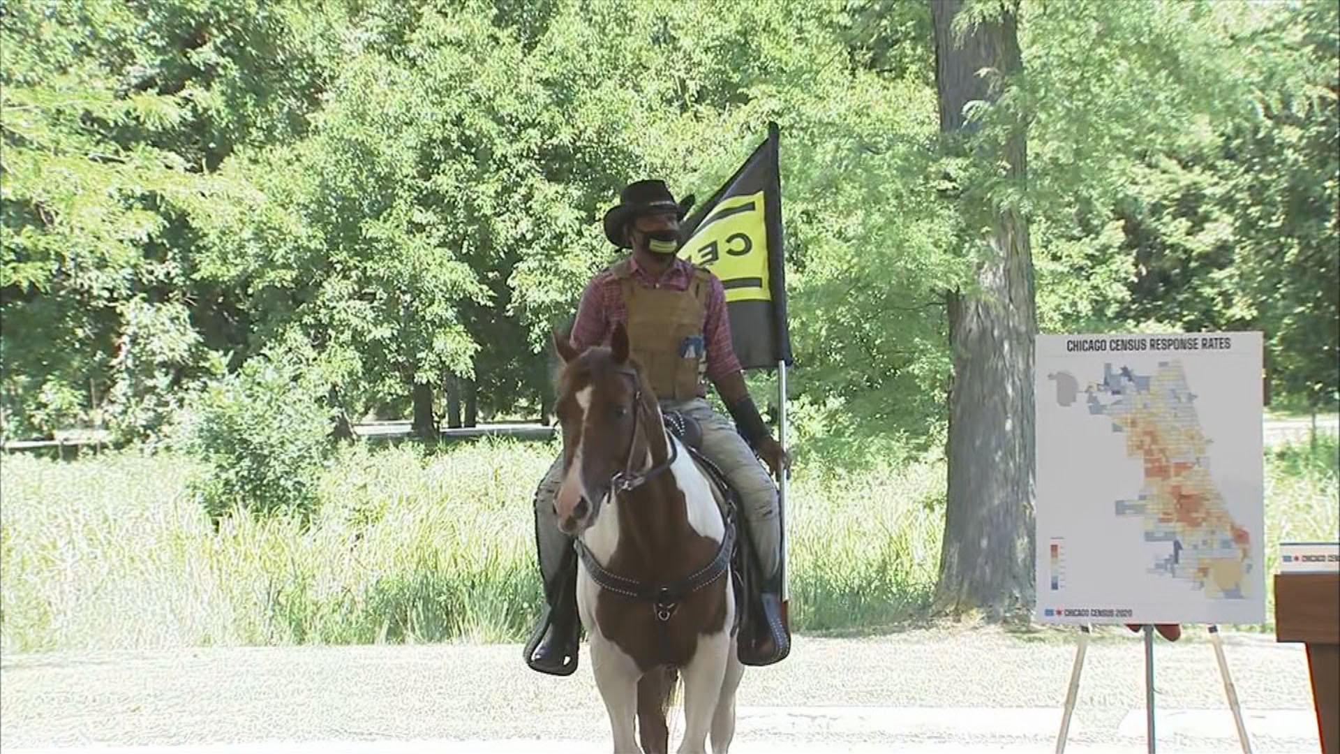 Adam Hollingsworth — aka the Dreadhead Cowboy — and his horse Prince make an appearance at a press conference in Chicago on Monday, July 13, 2020. (WTTW News)