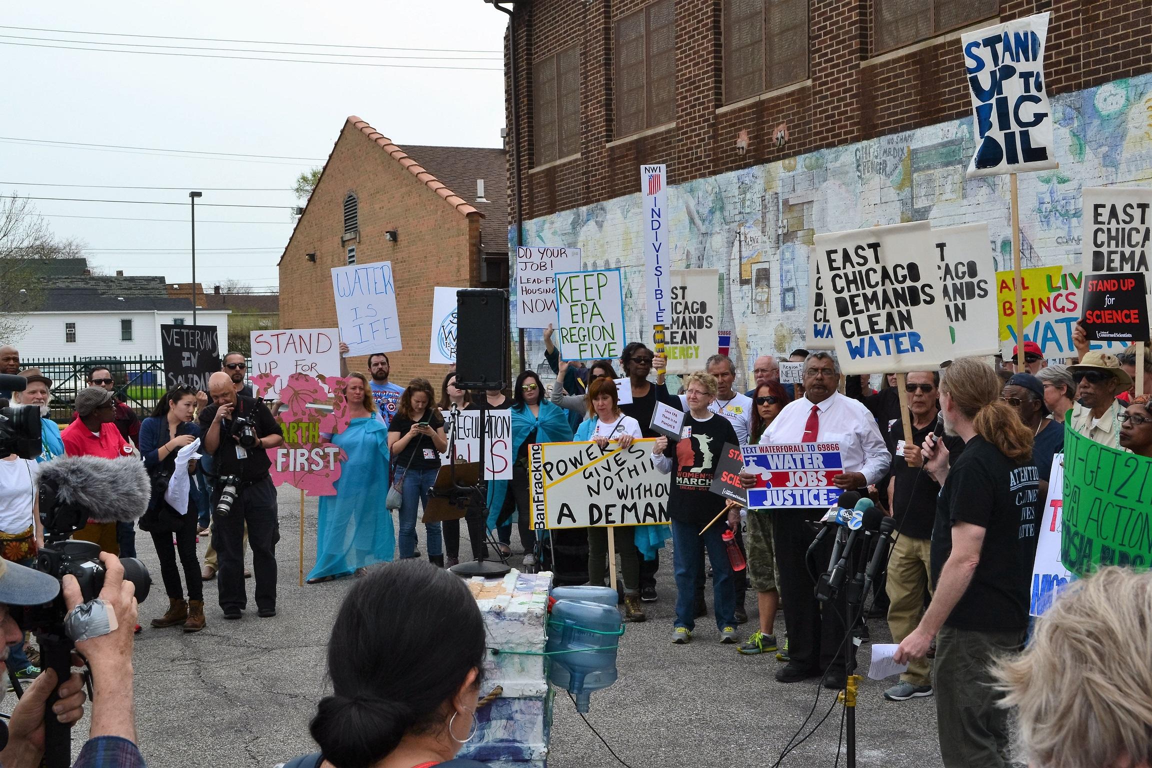 East Chicago resident Thomas Frank, right, speaks during a rally Wednesday prior to EPA head Scott Pruitt's visit. (Alex Ruppenthal / Chicago Tonight)