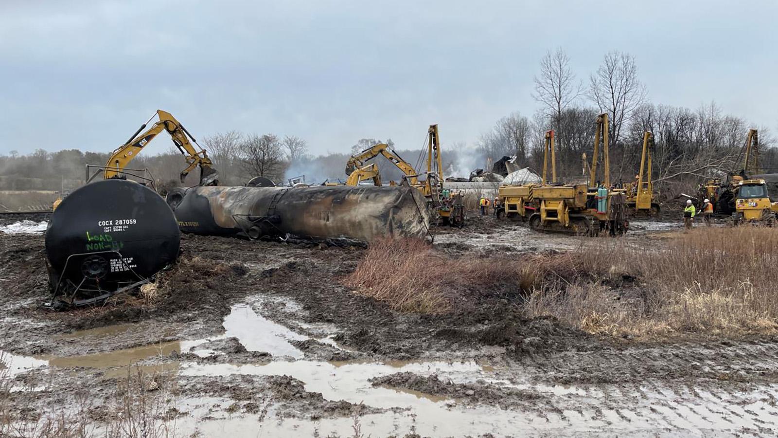 Norfolk Southern contractors remove a burned tank car from the crash site in East Palestine, Ohio. (Environmental Protection Agency)