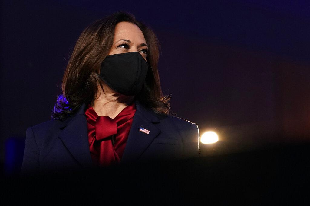Democratic vice presidential candidate Sen. Kamala Harris, D-Calif., listens as Democratic presidential candidate former Vice President Joe Biden speaks Friday, Nov. 6, 2020, in Wilmington, Del. (AP Photo / Carolyn Kaster)