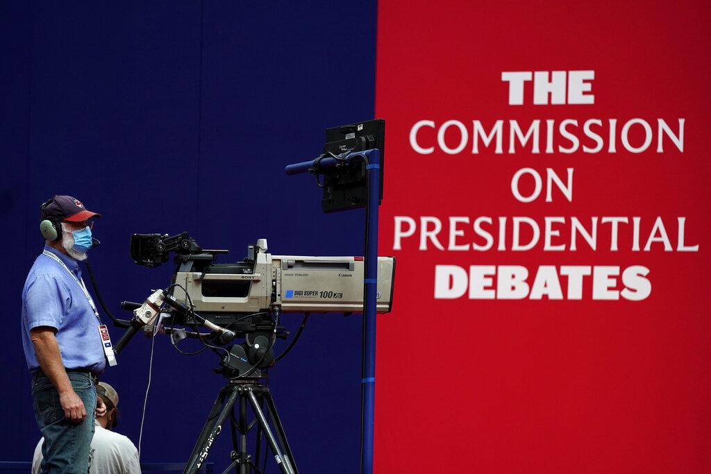 A camera operator waits for a rehearsal ahead of the first presidential debate between Republican candidate President Donald Trump and Democratic candidate former Vice President Joe Biden at the Health Education Campus of Case Western Reserve University, Monday, Sept. 28, 2020, in Cleveland. (AP Photo / Julio Cortez)