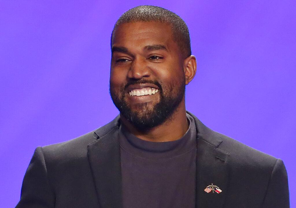 This Nov. 17, 2019, file photo shows Kanye West on stage during a service at Lakewood Church in Houston. (AP Photo / Michael Wyke, File)