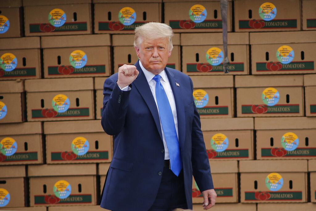 President Donald Trump arrives to speak about the “Farmers to Families Food Box Program” at Flavor First Growers and Packers, Monday, Aug. 24, 2020, in Mills River, N.C. (AP Photo / Nell Redmond)