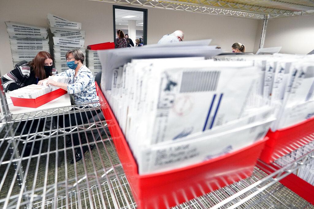 In this Nov. 5, 2020, photo, Lehigh County workers count ballots as vote counting in the general election continues in Allentown, Pa. (AP Photo / Mary Altaffer)