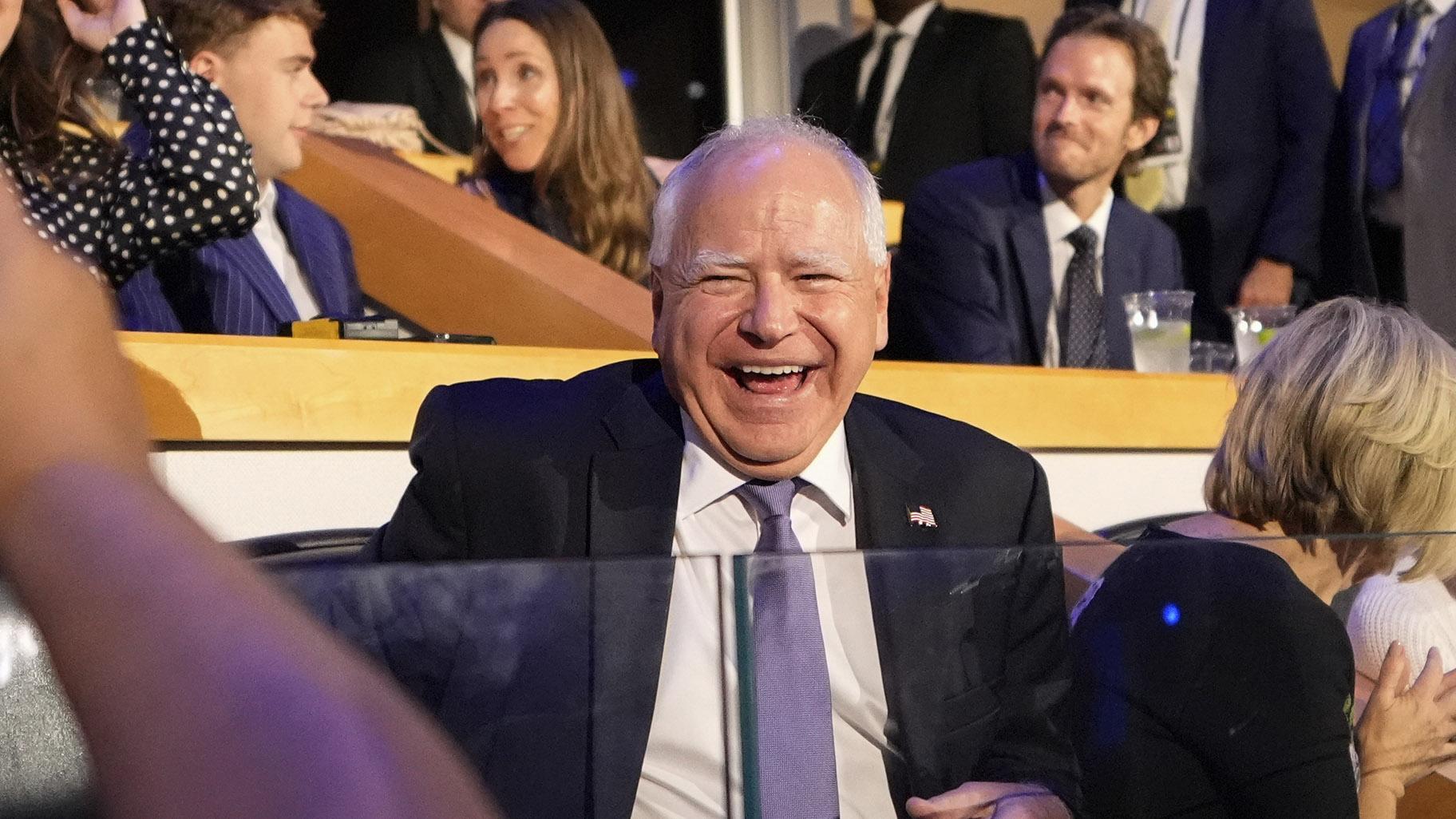 Democratic vice presidential nominee Minnesota Gov. Tim Walz laughs as he arrives at the Democratic National Convention Monday, Aug. 19, 2024, in Chicago. (AP Photo / Brynn Anderson)