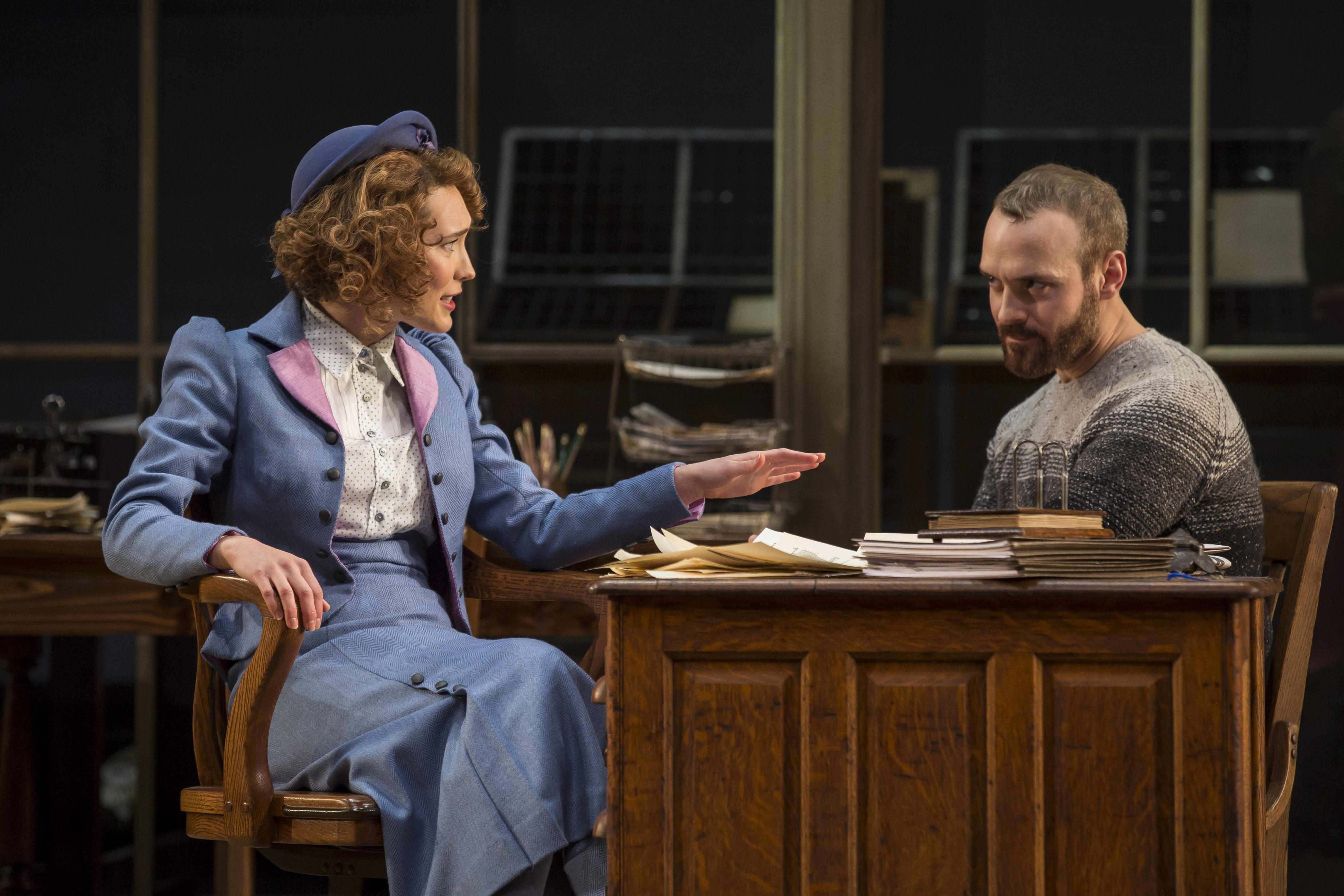 Rebecca Hurd (Petra) and Aubrey Deeker Hernandez (Hovstad) in “An Enemy of the People” by Henrik Ibsen, adapted and directed by Robert Falls at Goodman Theatre. (Credit: Liz Lauren)