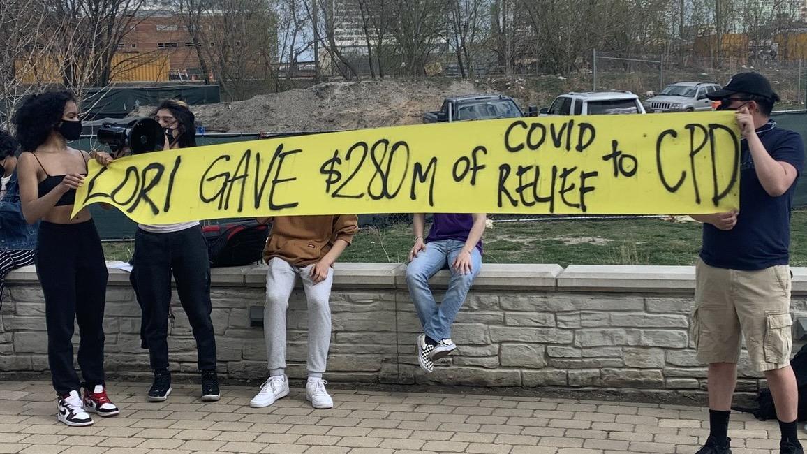 Protesters outside Ping Tom Park in Chinatown on April 6, 2021. (Heather Cherone / WTTW News)